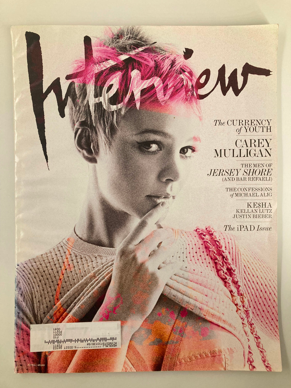 Cover of Interview Magazine April 2010 featuring Carey Mulligan, showcasing the theme 'The Currency of Youth' with vibrant colors and artistic design.