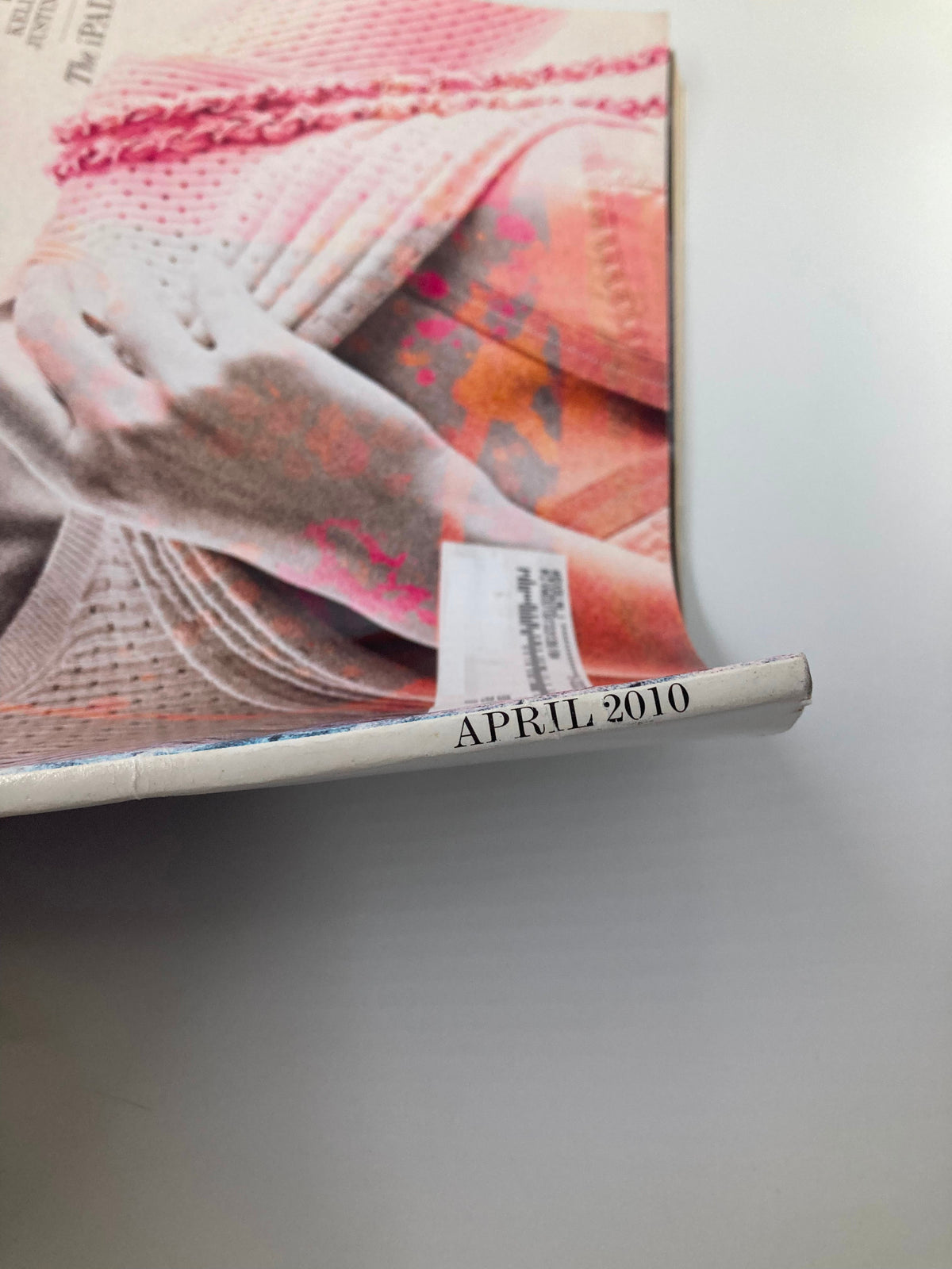 Side view detail of Interview Magazine April 2010, highlighting the spine with the month 'APRIL 2010' visible, emphasizing its vintage publication date.