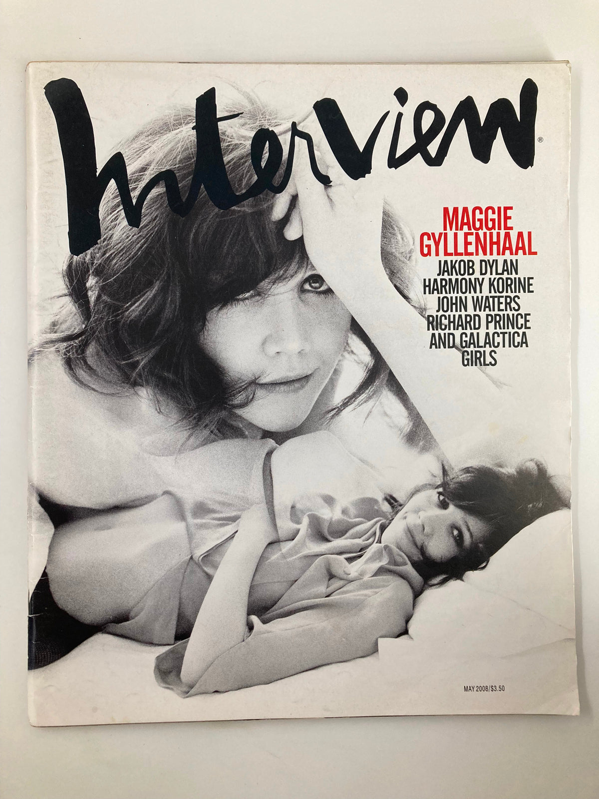 Cover of Interview Magazine May 2008 featuring Maggie Gyllenhaal, Jakob Dylan, Harmony Korine, John Waters, Richard Prince, and Galactica Girls. A striking vintage magazine cover that reflects pop culture history.