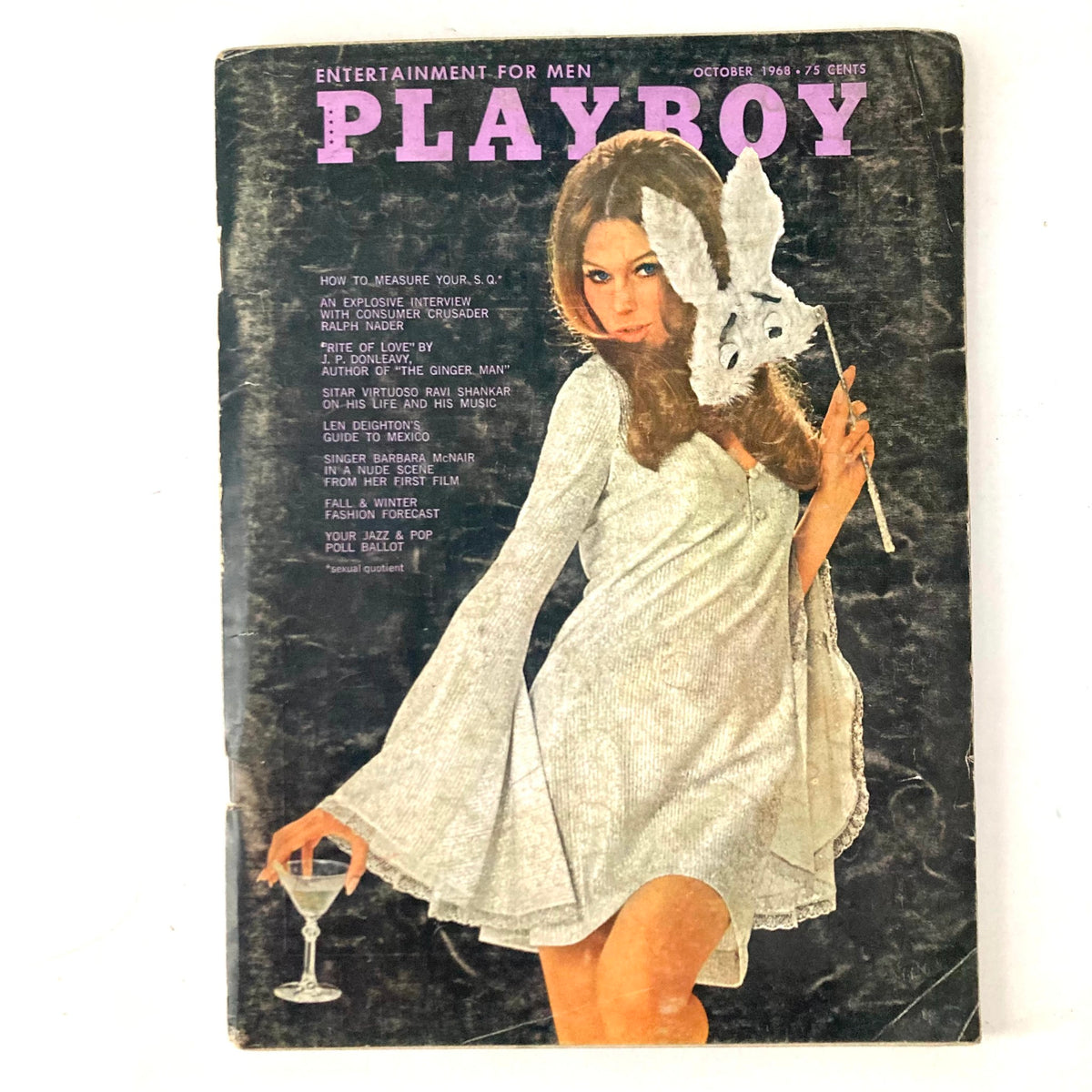Cover of VTG Playboy Magazine October 1968 featuring a model in a playful outfit with a rabbit headpiece and glass in her hand, showcasing iconic 1960s style and design.