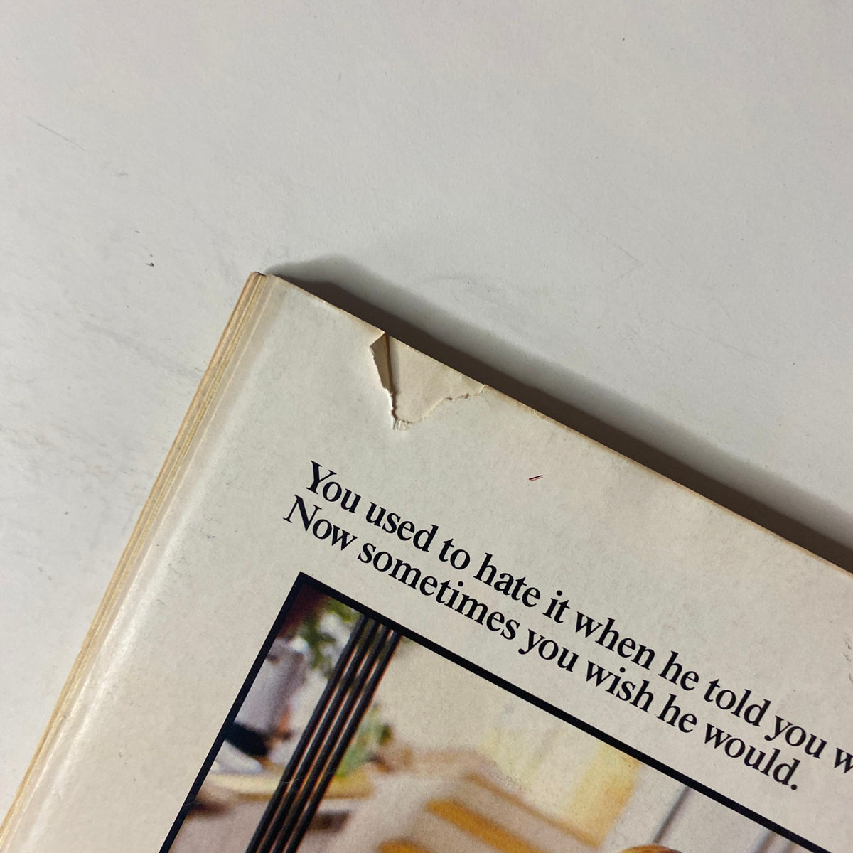 Detail of the back cover of Forbes Magazine September 19, 1988 showing a tear in the corner and Chivas Regal advertisement text 'What are you saving the Chivas for?'