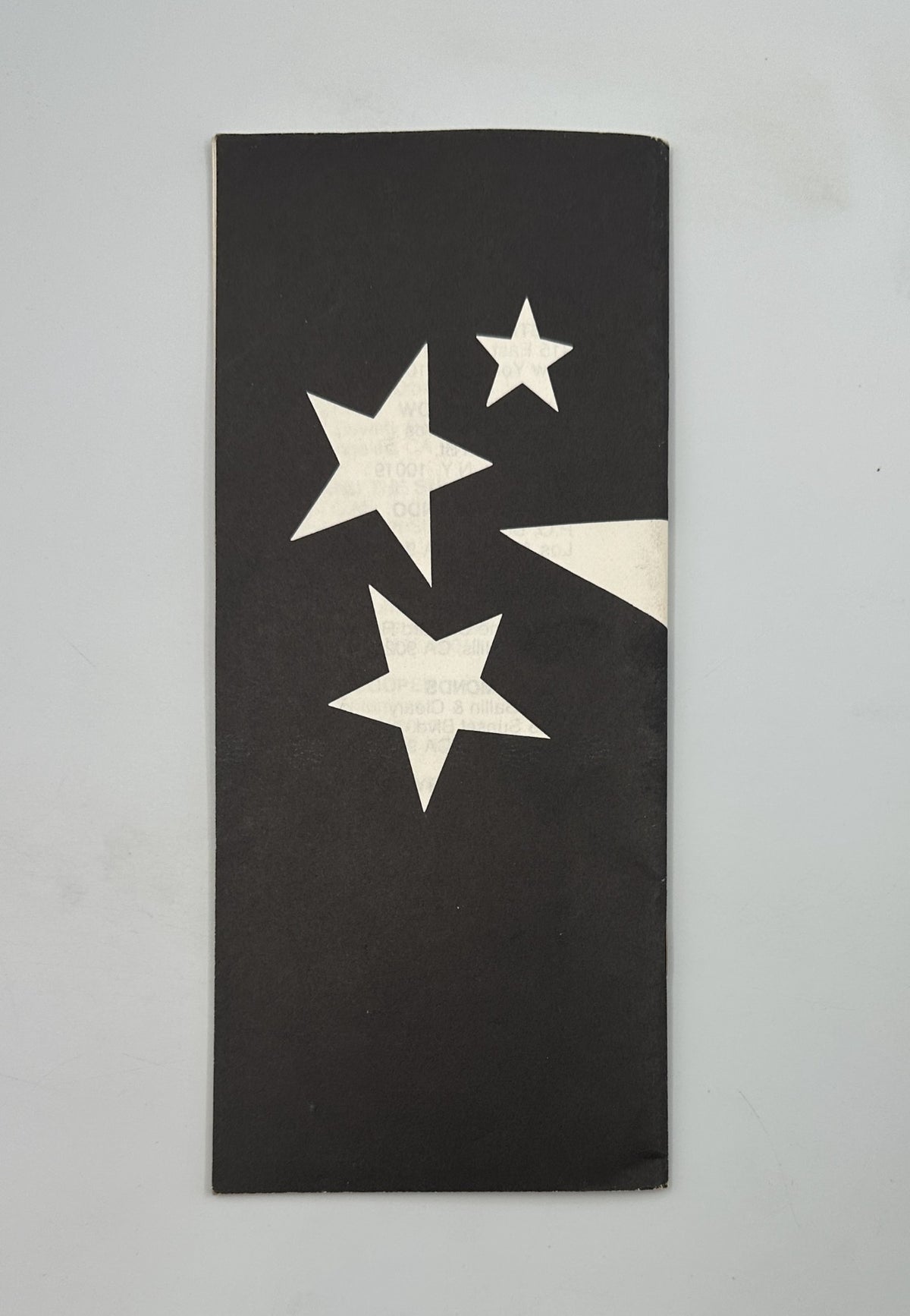 Back cover of the Teen Beat Magazine Official Star Directory featuring a minimalist design with stars, symbolizing the theme of teen idols and fan connection.