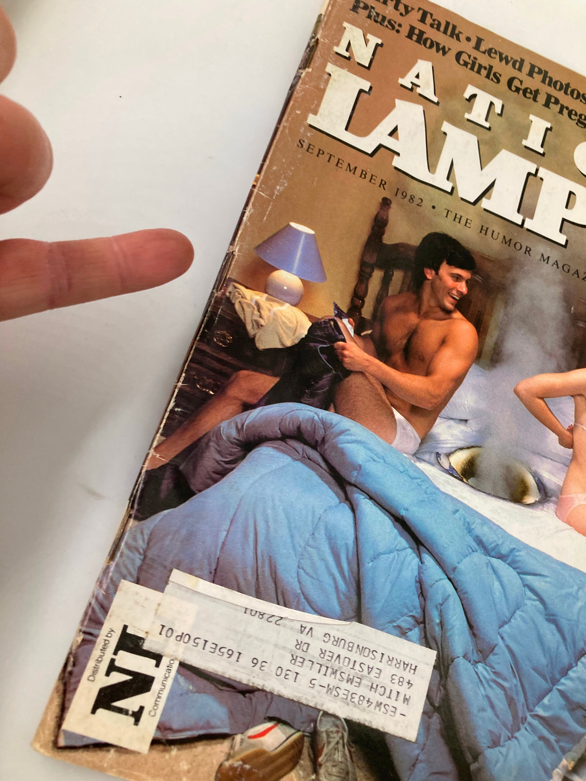 Close-up of the cover of National Lampoon Humor Magazine September 1982 highlighting bold titles and adult-themed content, emphasizing naughty coed hijinks.