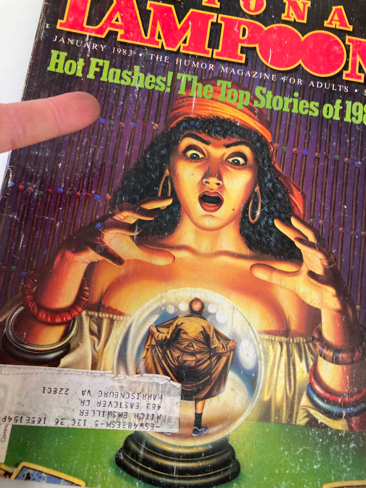 Cover of National Lampoon Humor Magazine January 1983 Edition featuring 'Hot Flashes! The Top Stories of 1983' with an illustration of a surprised woman and a crystal ball.
