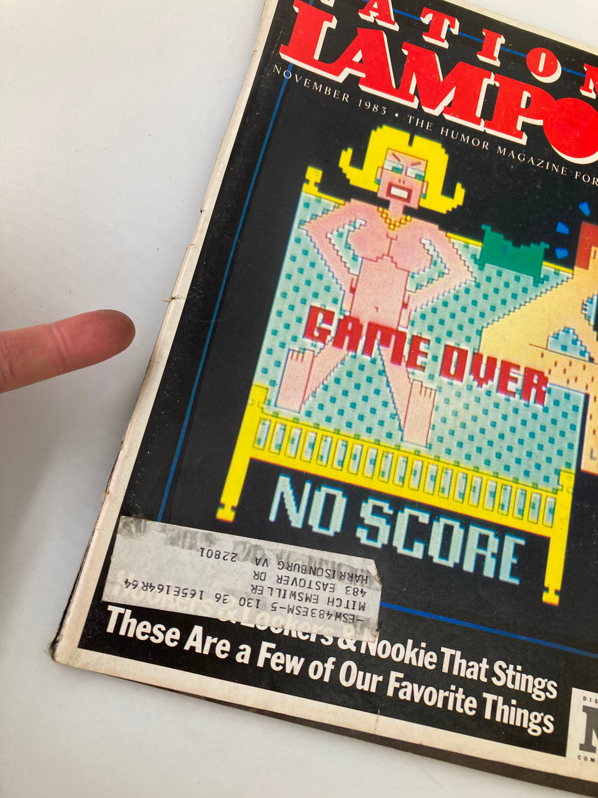 Close-up of the cover of National Lampoon Humor Magazine, November 1983, showcasing a funny cartoon depiction related to salesmanship.
