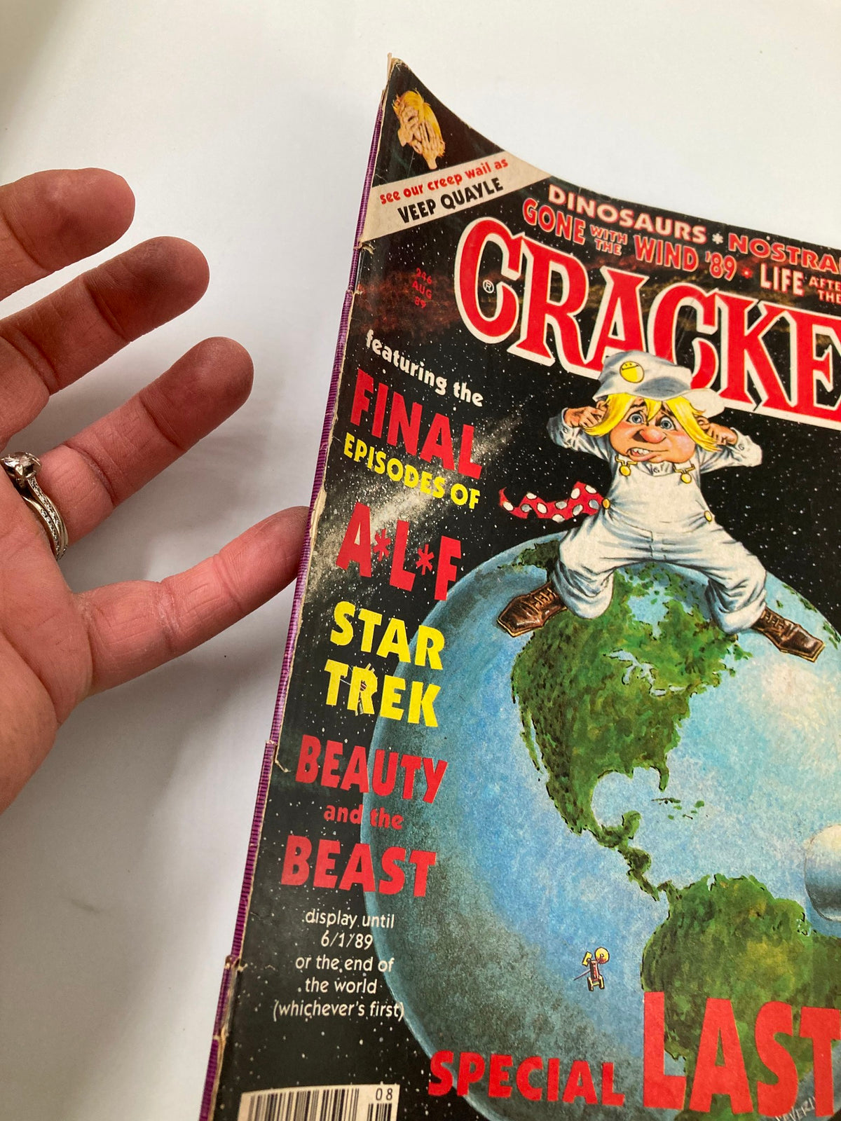 Close-up view of Cracked Humor Magazine August 1989 cover showing details and features such as the final episodes of ALF, and additional comedic elements typical of the era.