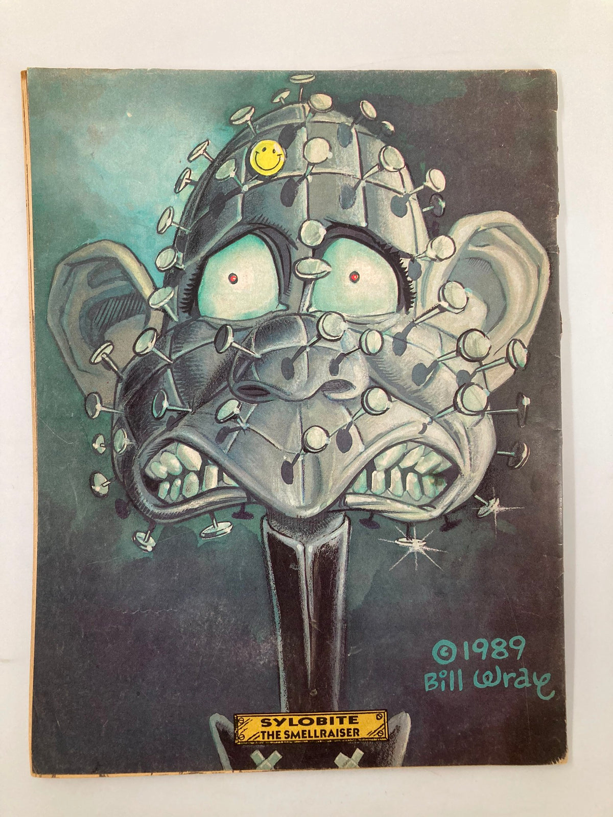 Back cover of Cracked Humor Magazine July 1989 featuring a humorous character design titled 'Sylobite: The Smellraizer' with distinctive artwork.
