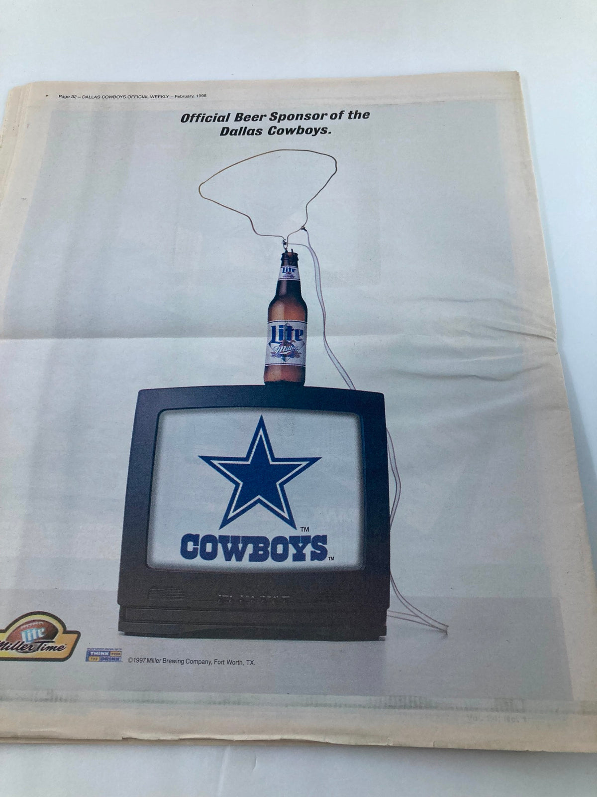 Dallas Cowboys Weekly Newspaper February 1998 Vol 24 #1 advertisement showcasing the official beer sponsor of the Dallas Cowboys, featuring a television set with a Cowboys logo.