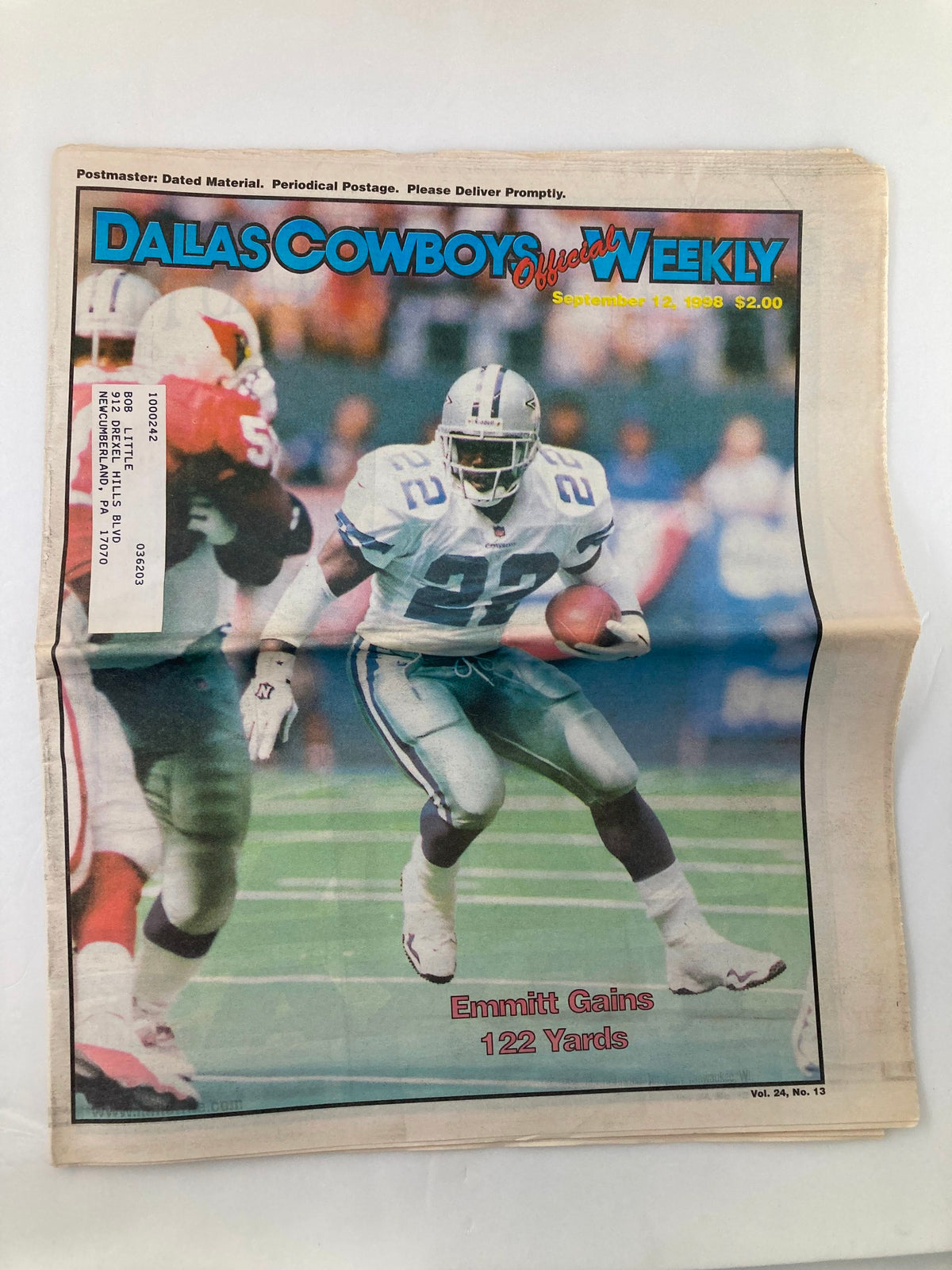 Dallas Cowboys Weekly Newspaper September 12 1998 Vol 24 #13 featuring Emmitt Smith, showcasing him gaining 122 yards during a game.