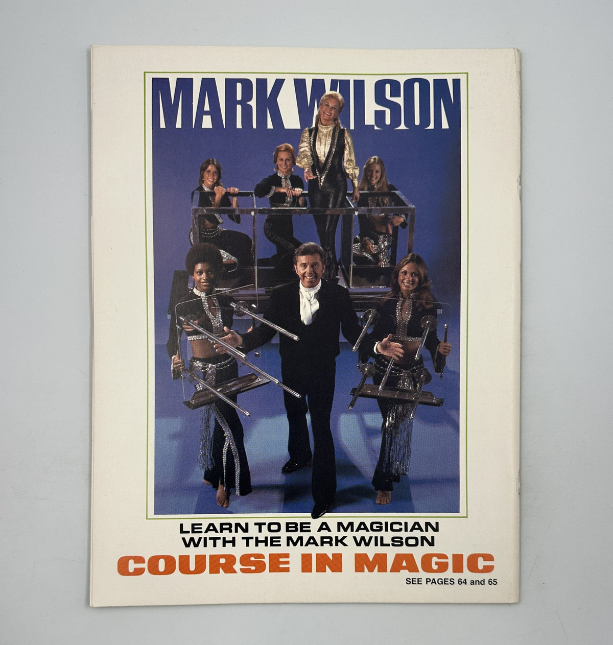 Promotional flyer for Mark Wilson's 'Course in Magic', emphasizing learning magic skills with Mark Wilson, featured in The Magic Magazine February 1975.
