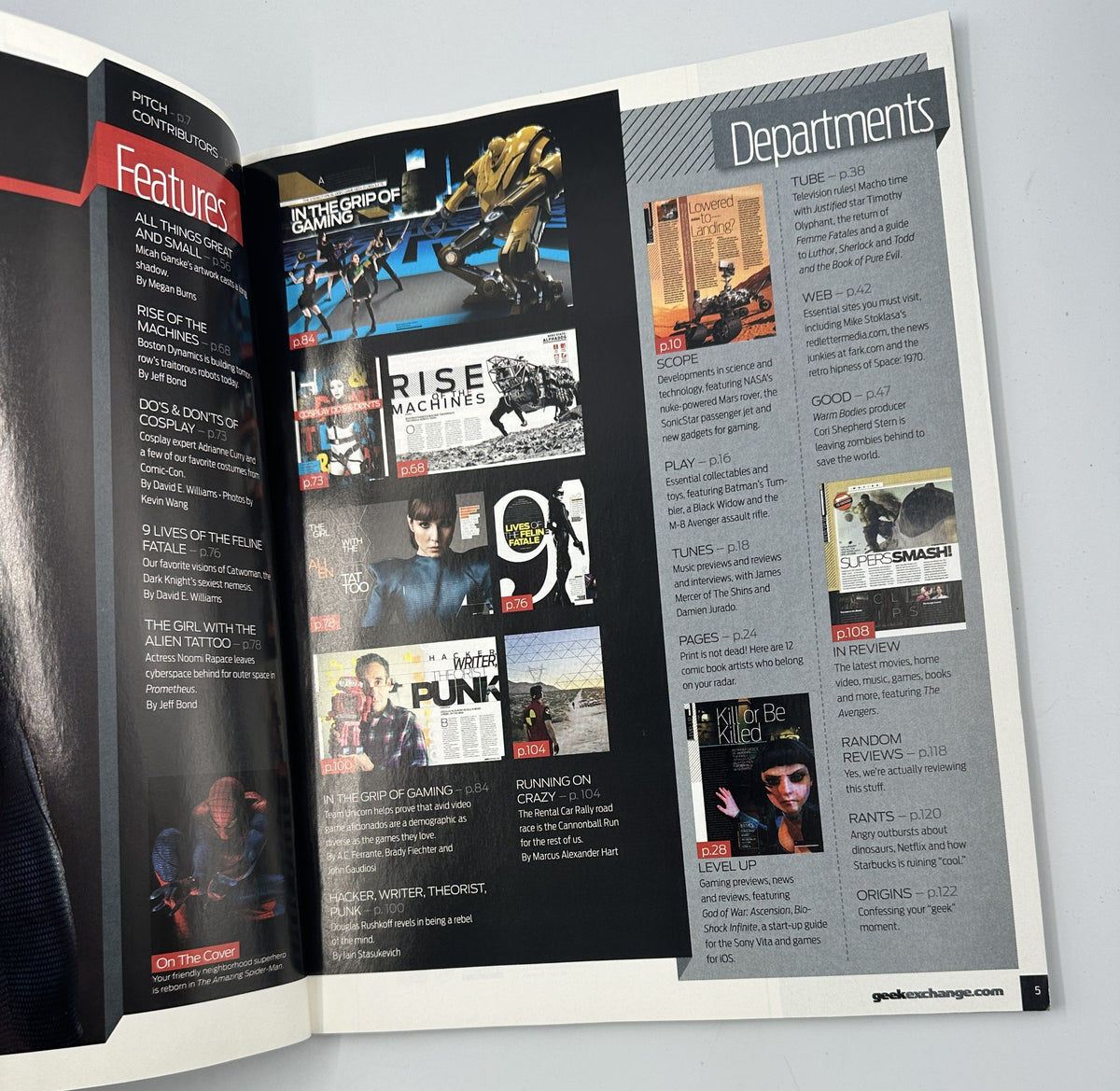 Inside spread of Geek Magazine highlighting departments and features, including gaming, technology, and entertainment related to The Amazing Spider-Man and Noomi Rapace.