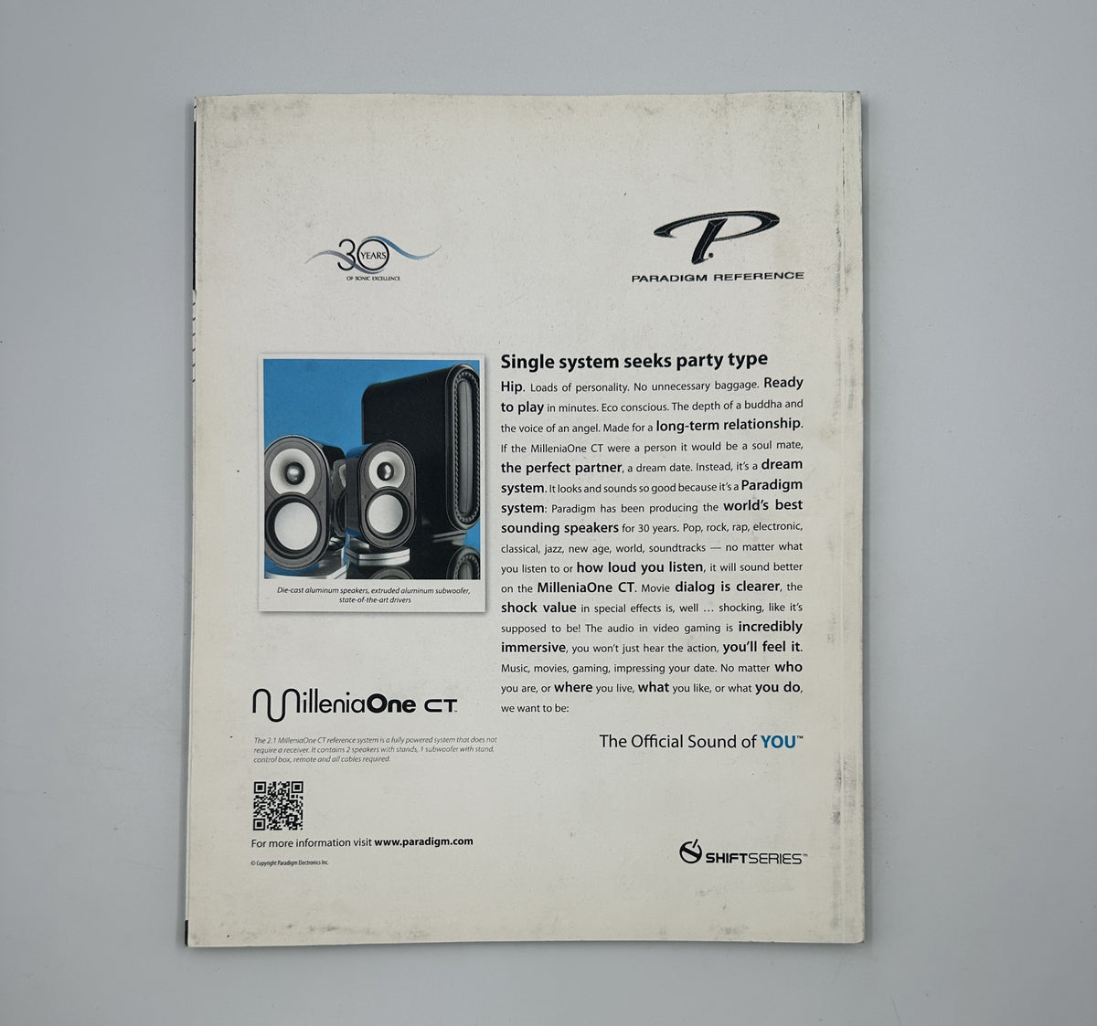 Back cover of Geek Magazine featuring an advertisement for Paradigm speakers, emphasizing high-quality sound systems, with references to Geek Magazine's themes of technology and entertainment.