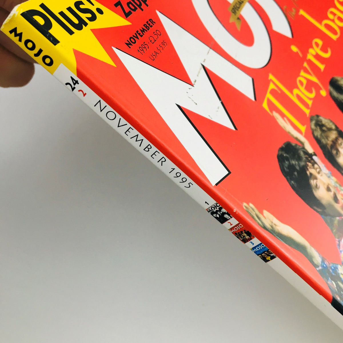 Mojo Magazine November 1995 featuring The Beatles on the cover, showcasing its spine with the publication date and details. A vintage collectible highlighting the band's resurgence in the 90s.
