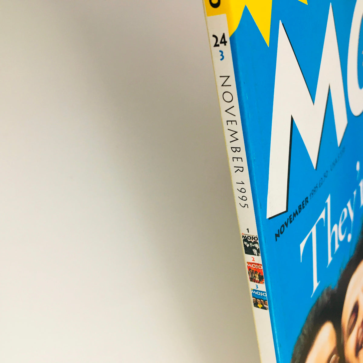 Side view of Mojo Magazine November 1995 Vol 24 #3 displaying the spine with the date 'November 1995' and issue number '24 #3', alongside the magazine’s logo, emphasizing its collectibility.