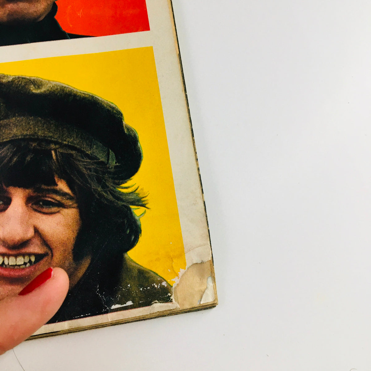 Image of Ringo Starr on the 16 Scoop Magazine 1965 cover, emphasizing his joyful expression and the colorful background with the title 'Complete Story From Birth to Now'.
