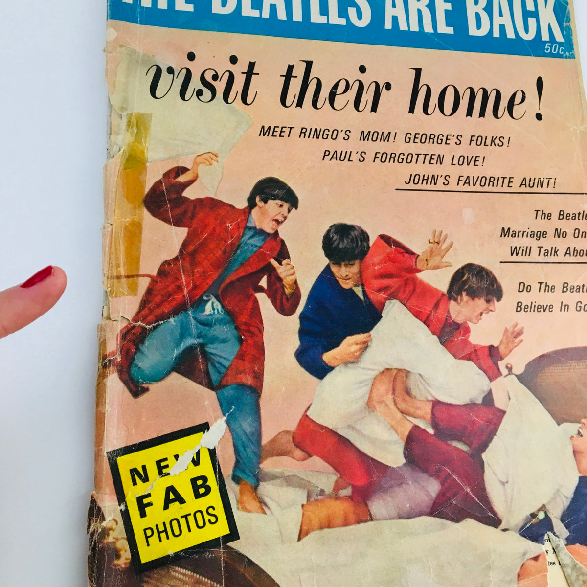 Another angle of the 1964 The Beatles Are Back and Visit Their Home magazine cover, highlighting the playful interaction of the band members, indicative of their camaraderie and charm.