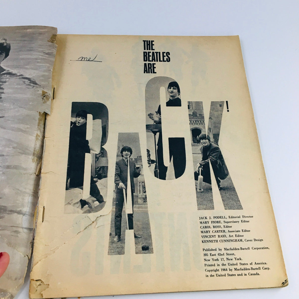 Inside page of the 1964 The Beatles Are Back and Visit Their Home featuring bold typography and imagery of the band, illustrating the historical significance of the publication.