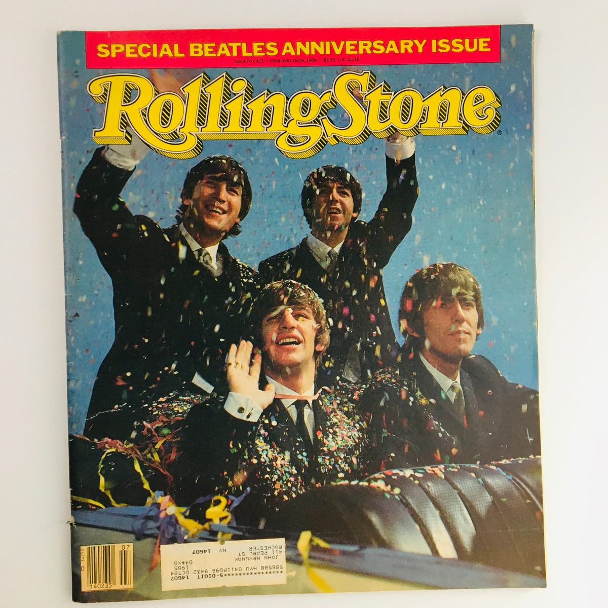 Cover of Rolling Stone Magazine February 16, 1984, celebrating The Beatles' 20th Anniversary, featuring a vibrant image of the band members surrounded by confetti and celebration, ideal for music collectors and vintage magazine enthusiasts.