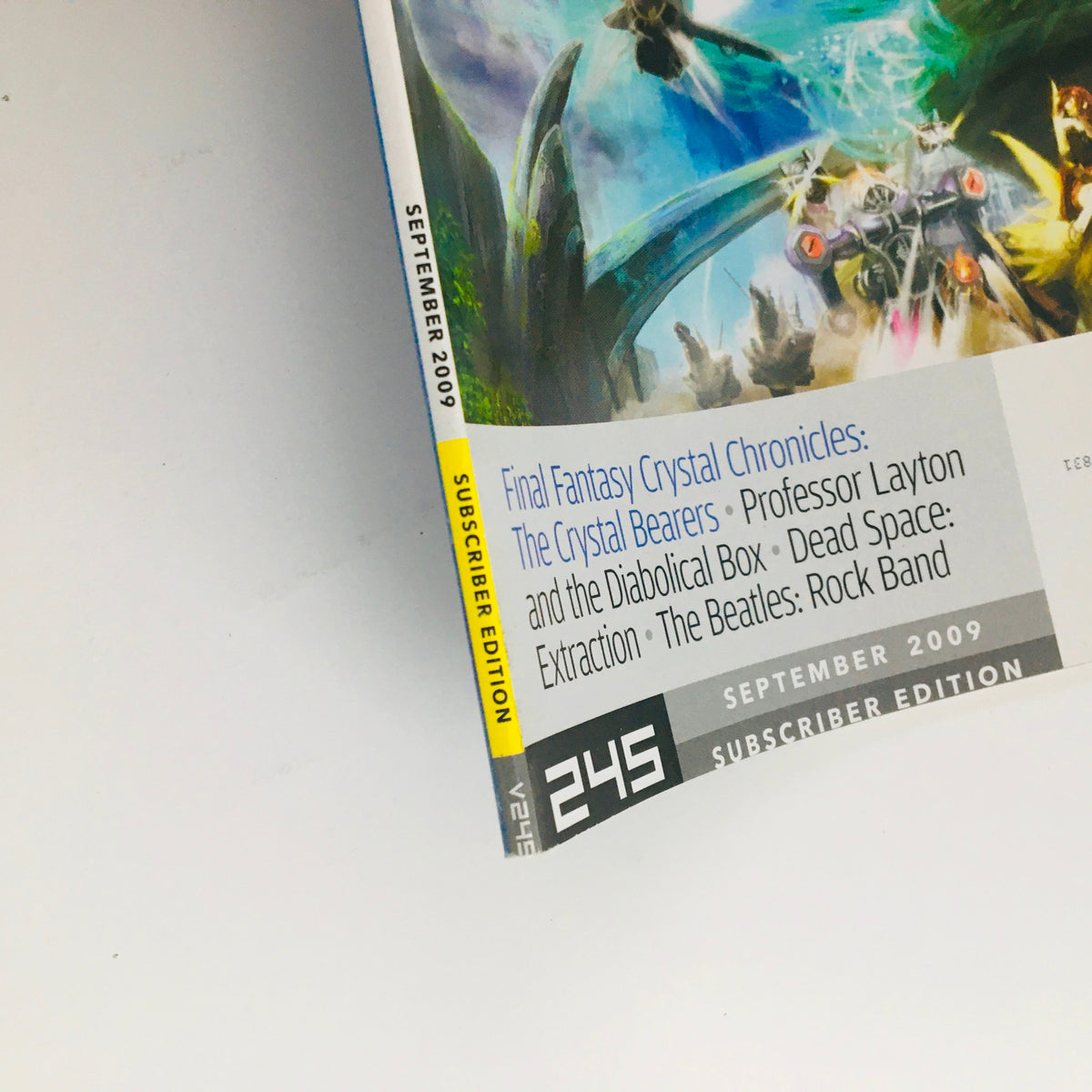 Spine view of Nintendo Power Magazine September 2009, highlighting the issue number 245 and mentioning Final Fantasy Crystal Chronicles among featured titles, ideal for vintage magazine enthusiasts.