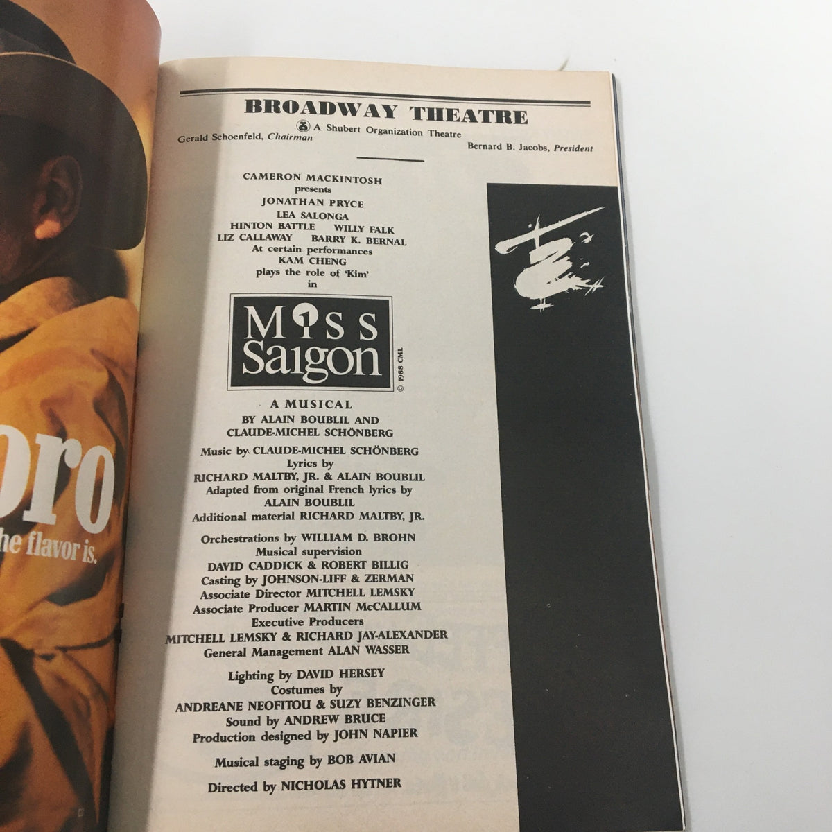 Another interior page of the 1991 Playbill for Miss Saigon, detailing the cast and production team, directed by Nicholas Hytner.