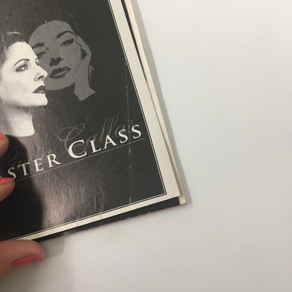 Detailed image of the 1996 Playbill Golden Theatre for Patti LuPone in Maria Callas' Master Class, capturing minor wear and creases on the cover.