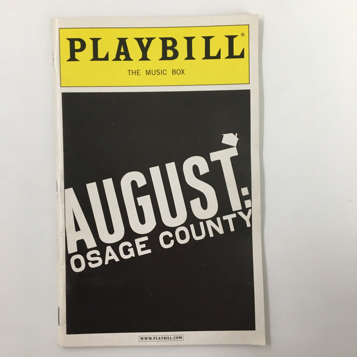 2008 Playbill for August: Osage County, directed by Anna D. Shapiro, featuring a striking black and yellow cover.
