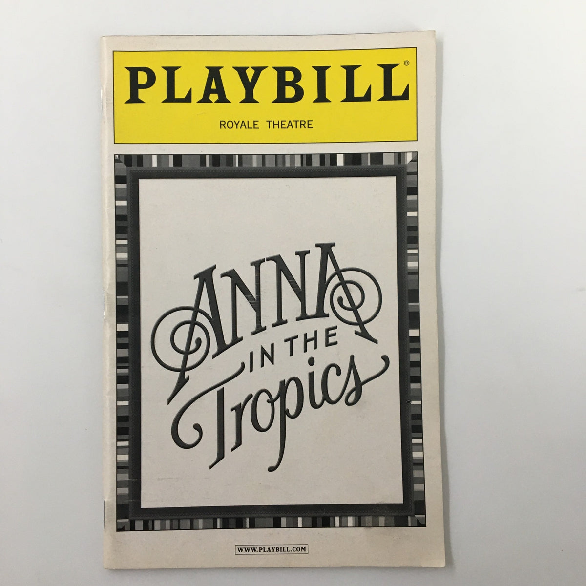 2003 Playbill for 'Anna In The Tropics' at Royale Theatre featuring artistic cover design, highlighting the title in elegant typography.