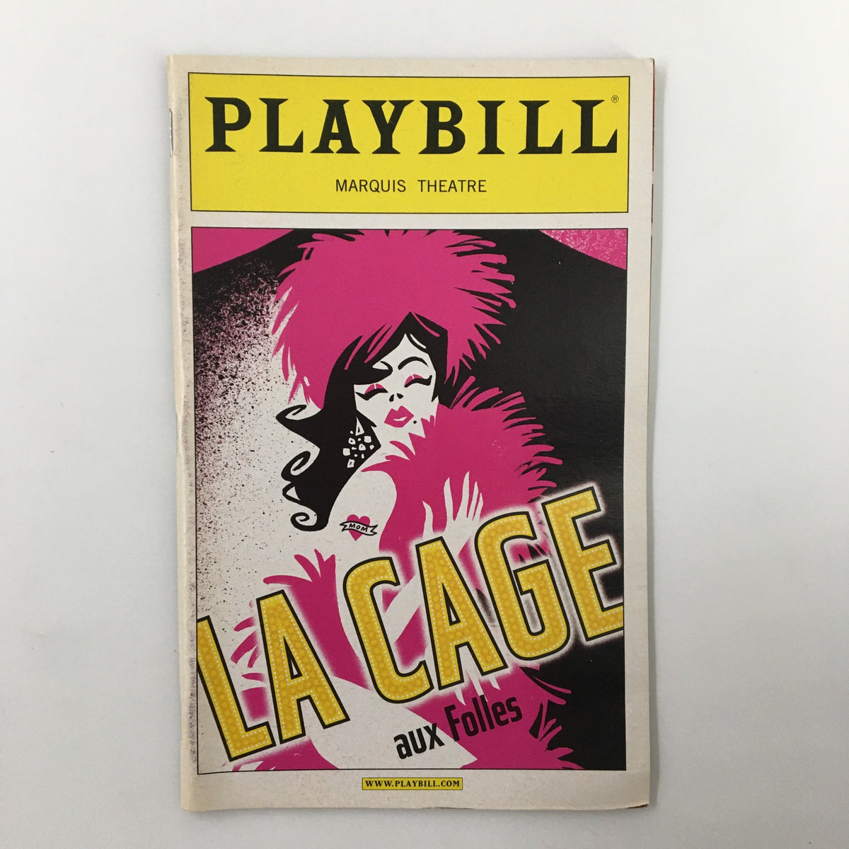2004 Playbill featuring La Cage Aux Folles at the Marquis Theatre, showcasing vibrant cover art with bold colors and design.
