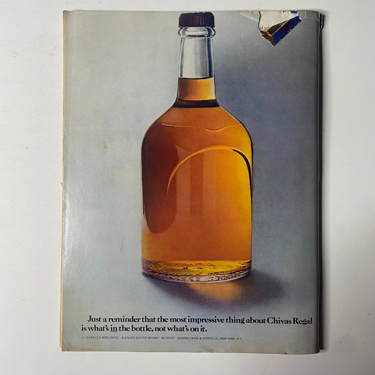 Back cover of Forbes Magazine September 21, 1987 featuring Chivas Regal whiskey advertisement with an artistic depiction of a whiskey bottle and a tagline promoting the beverage.