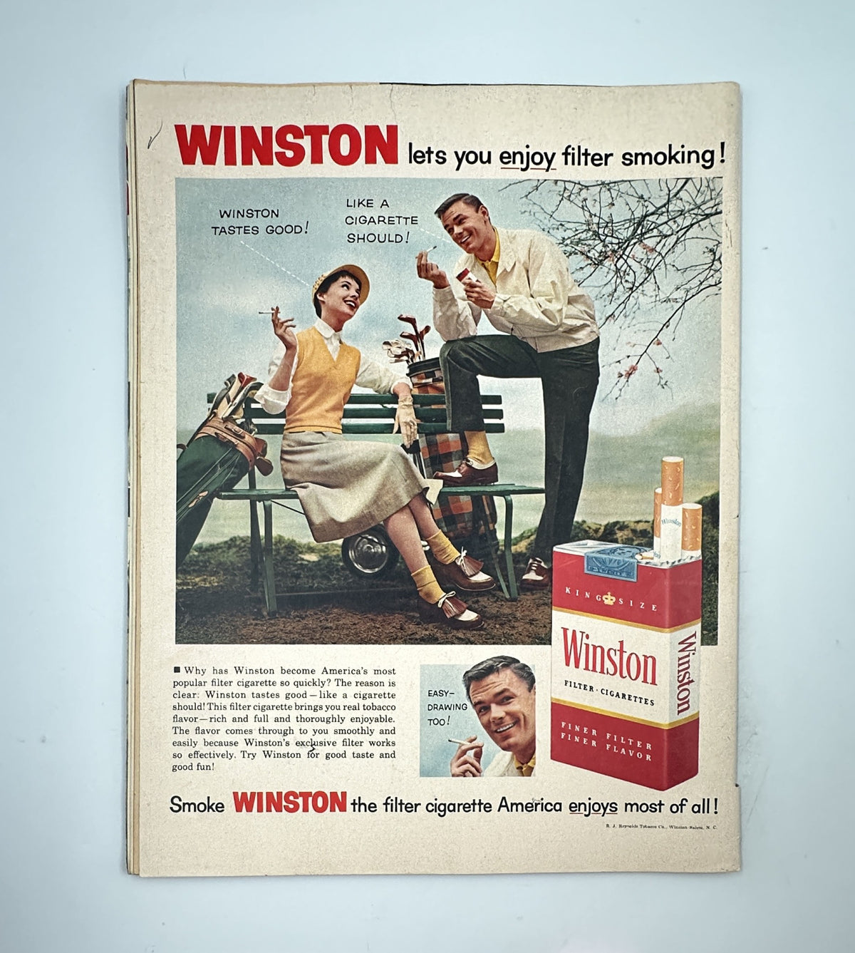 Advertisement page in Collier’s Magazine May 25, 1956 promoting Winston cigarettes with a cheerful couple enjoying outdoors, emphasizing the filter feature.