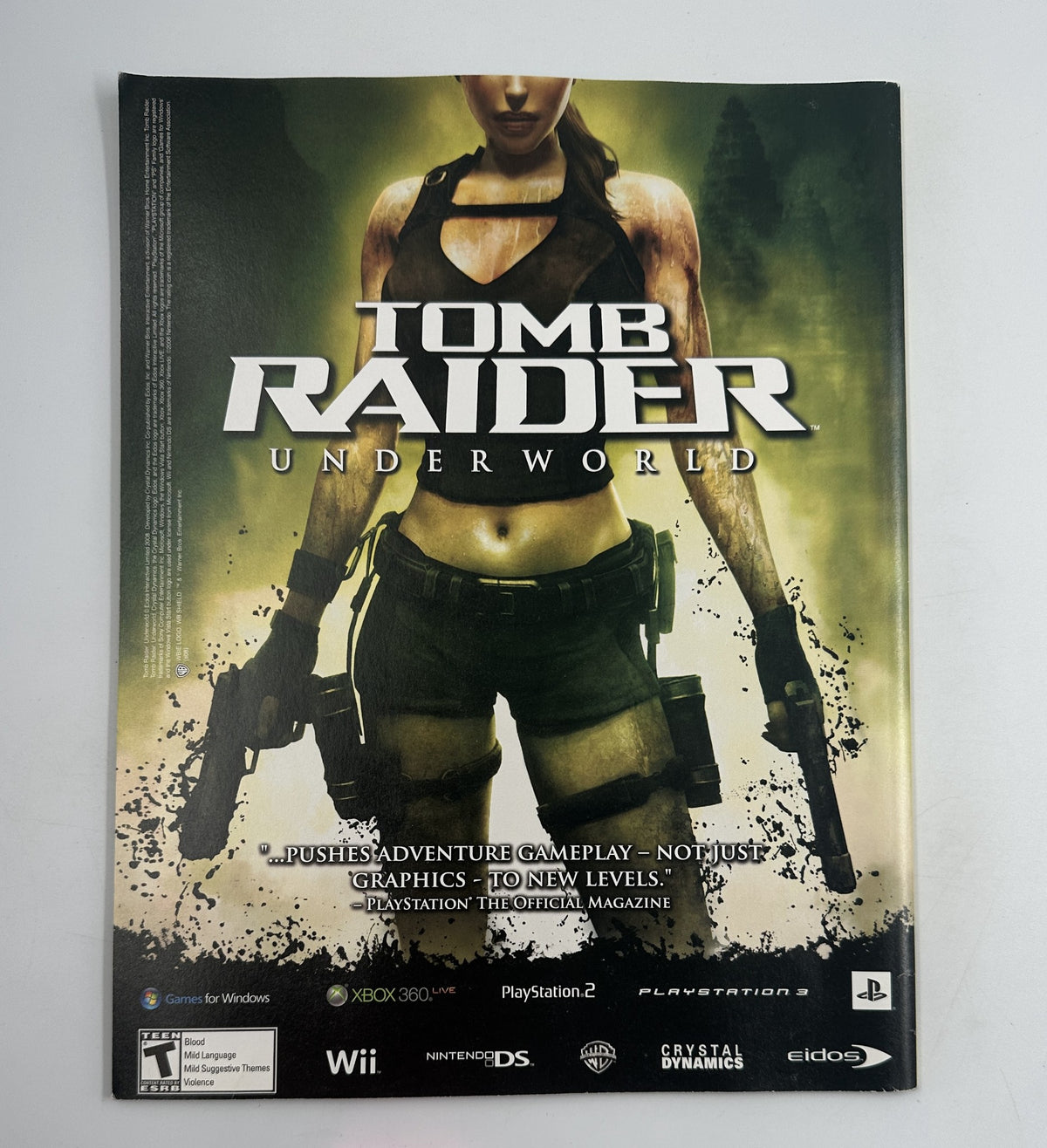 Advertisement for Tomb Raider Underworld in Geek Magazine December 2008, promoting the game for various gaming platforms including PlayStation and Xbox.