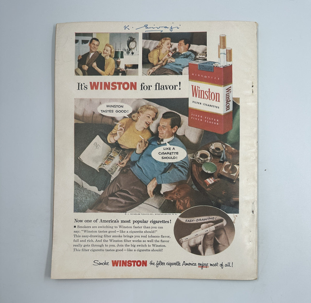 Promotional page for Winston cigarettes, featuring a couple in a cozy living room setting, highlighted in Photoplay Magazine March 1956.