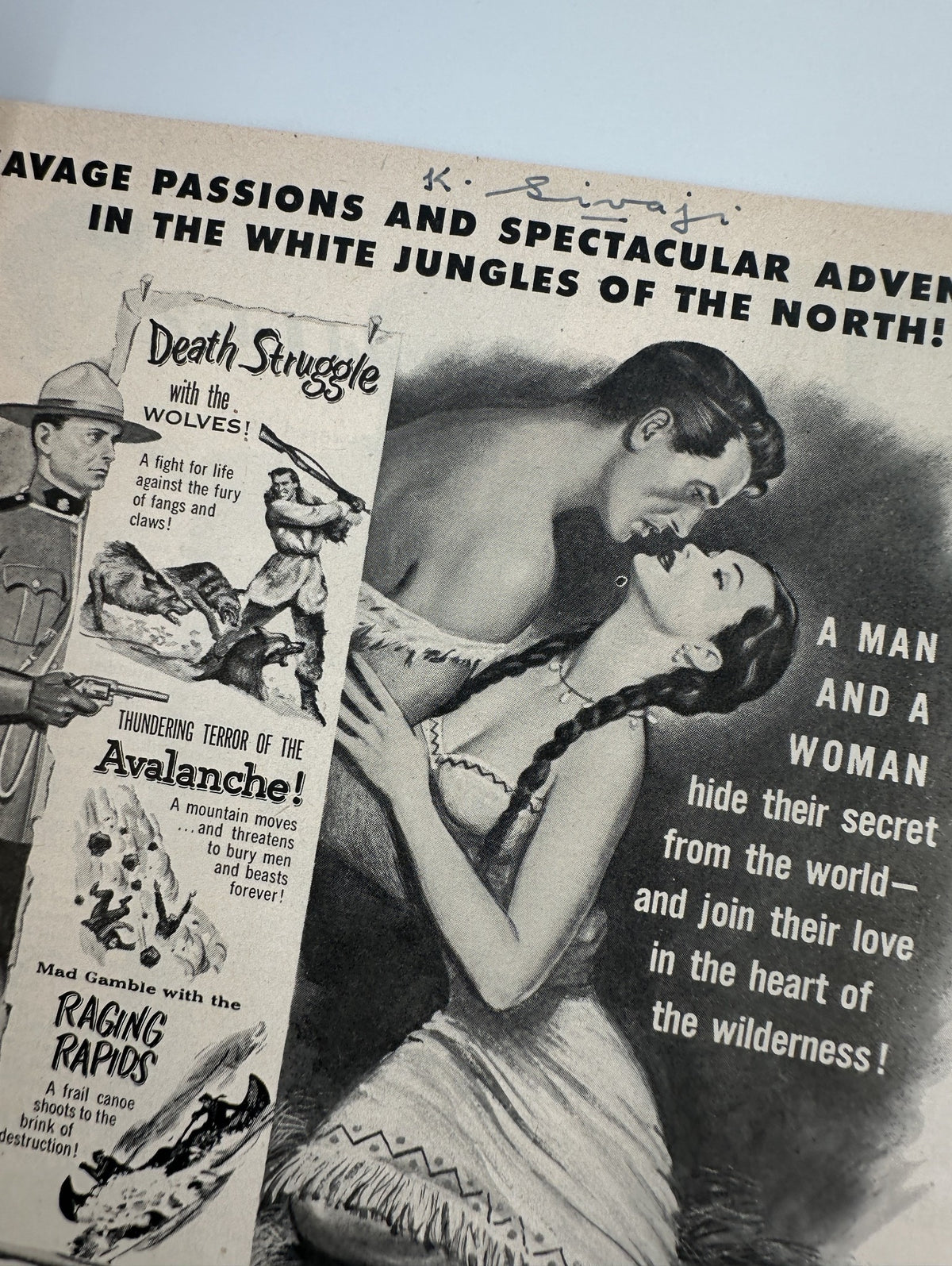 Inside page of Photoplay Magazine March 1952 featuring an advertisement for 'The Wild North', highlighting dramatic movie themes.