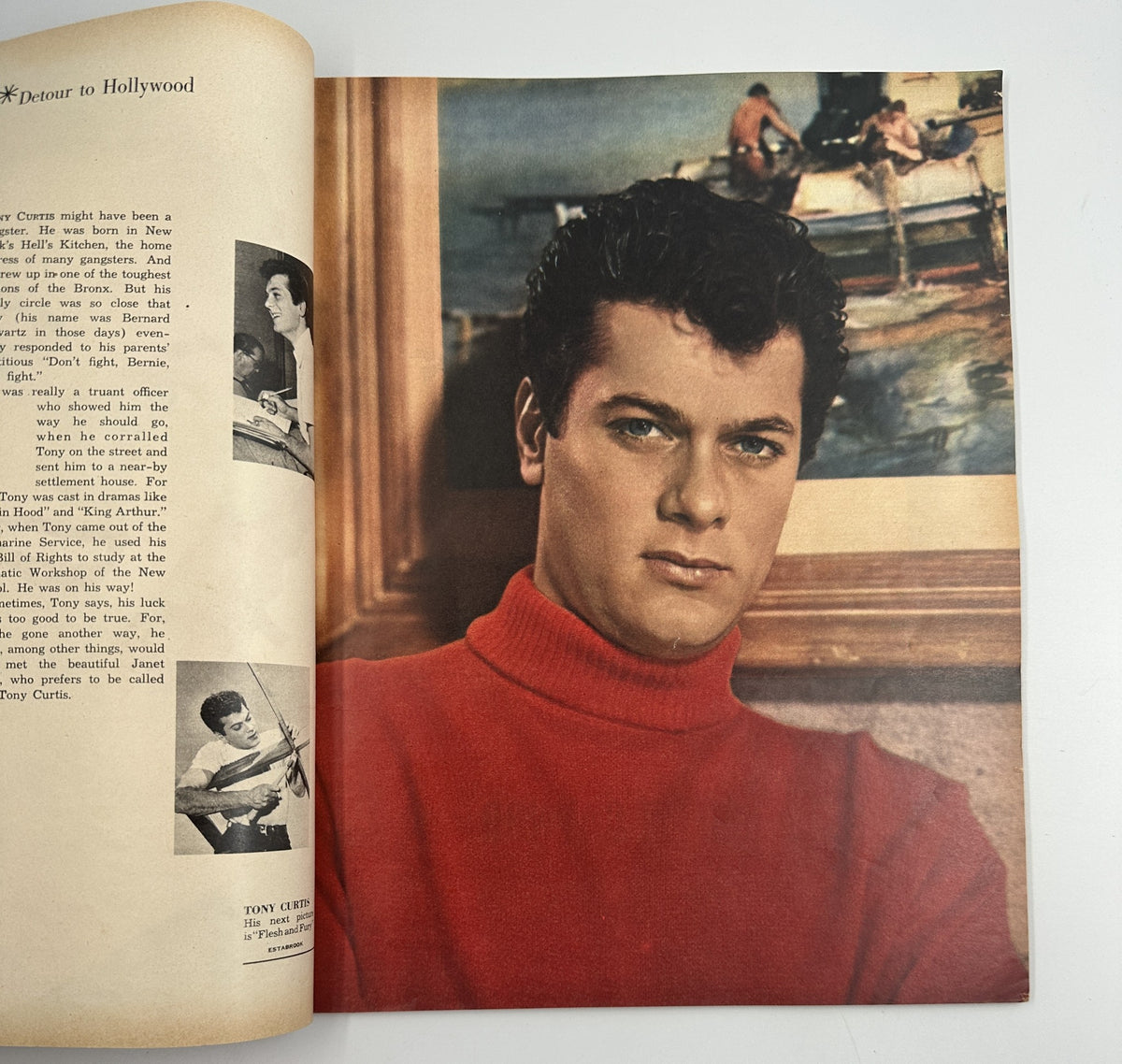 Page from the Photoplay Annual Magazine 1952 featuring Tony Curtis in a red turtleneck, along with a brief overview of his career.