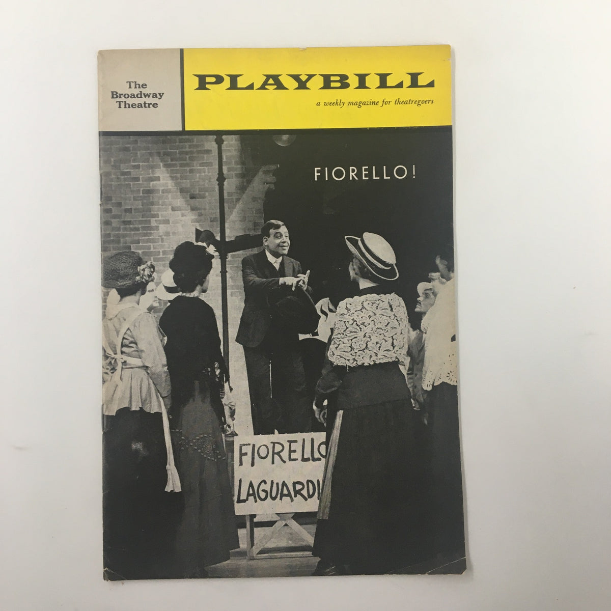 1961 Playbill for Fiorello! showcasing Tom Bosley and Willi Burke, featuring black and white imagery from the Broadway Theatre performance.