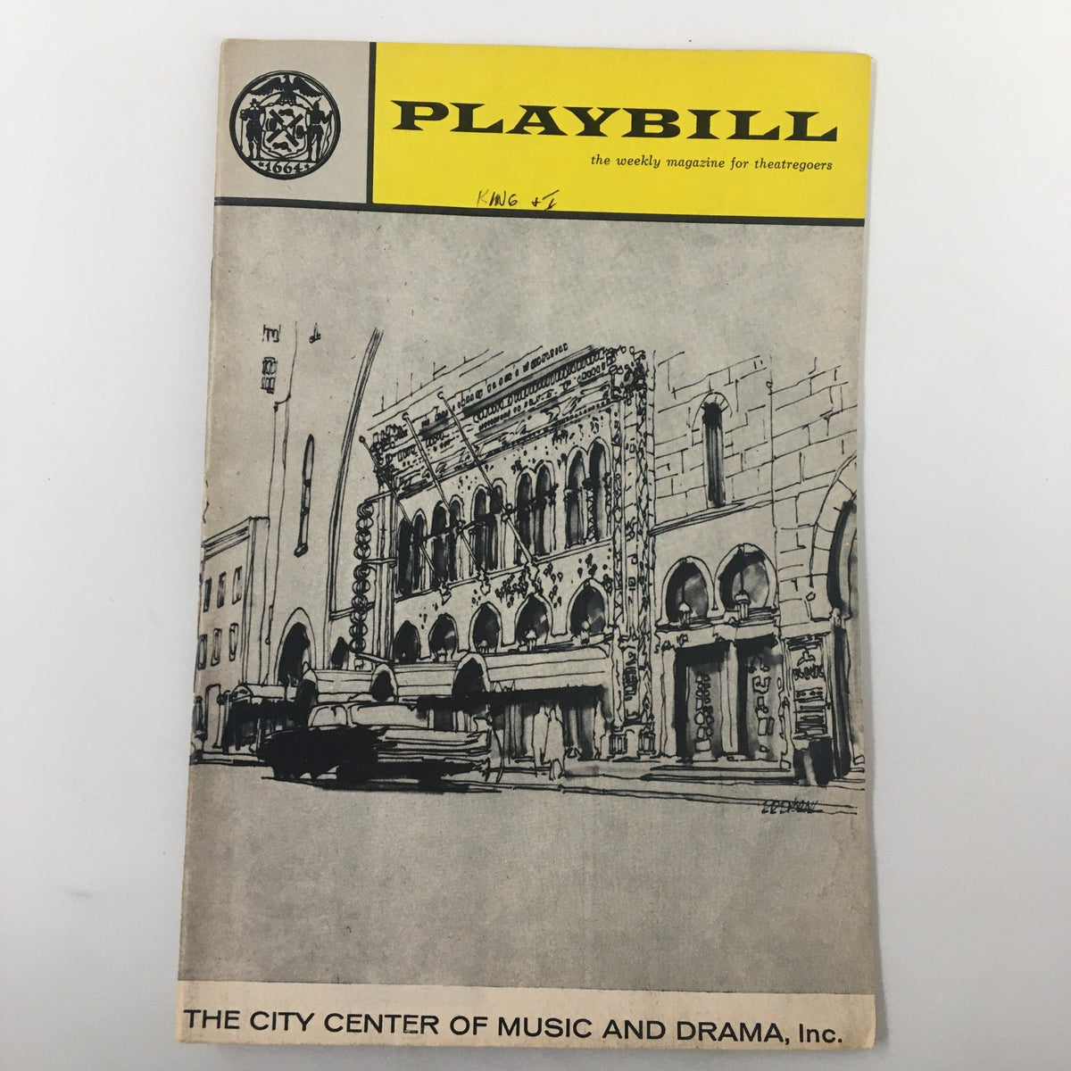 1963 Playbill from The King and I, featuring a vintage illustration of the New York City Center, representing a piece of theater memorabilia showcasing Eileen Brennan and Anita Darian.