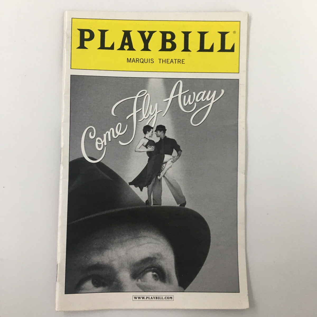 2010 Playbill for Come Fly Away, featuring an iconic cover image with dancers at the Marquis Theatre.