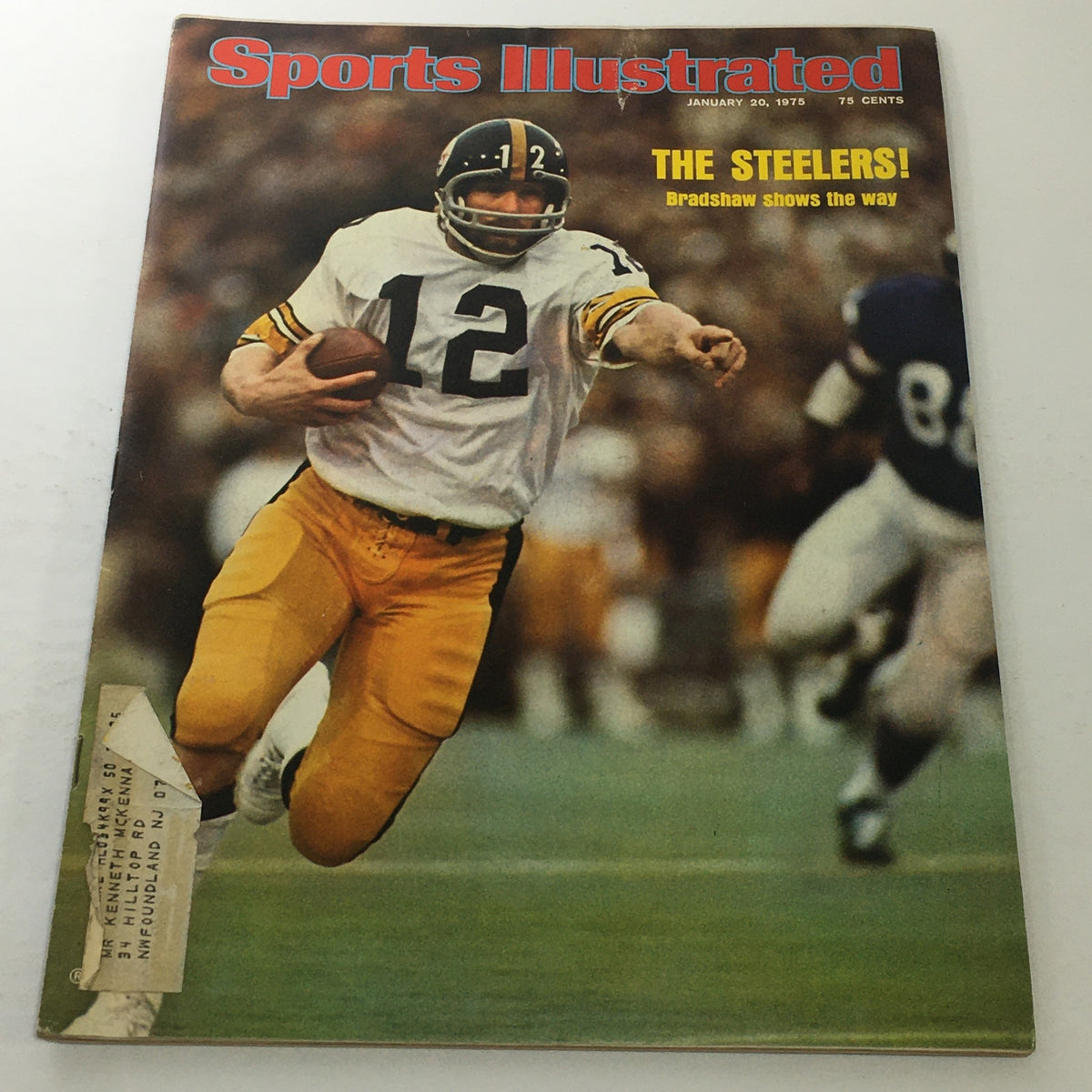 Cover of Sports Illustrated dated January 20, 1975, featuring Terry Bradshaw of the Pittsburgh Steelers in a dynamic pose, highlighting the article 'The Steelers! Bradshaw shows the way'. This vintage magazine captures the essence of 1970s sports culture.