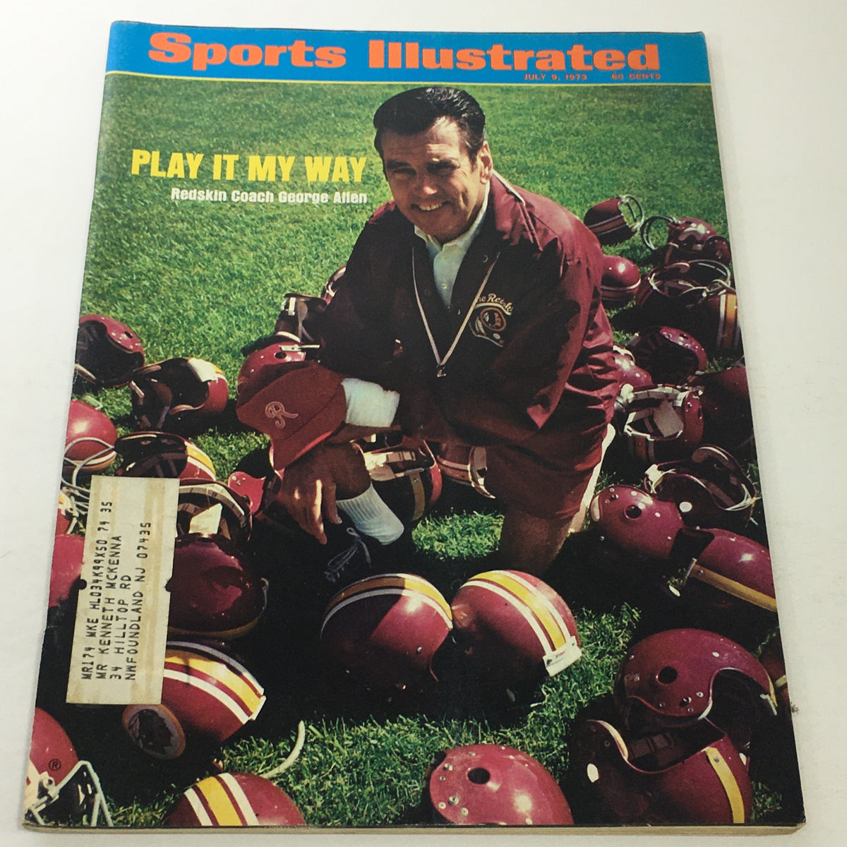 Sports Illustrated July 9 1973 issue featuring Redskin Coach George Allen with the headline 'Play It My Way'. The magazine showcases a cover image of Allen on a football field surrounded by helmets, highlighting a key moment in NFL history.