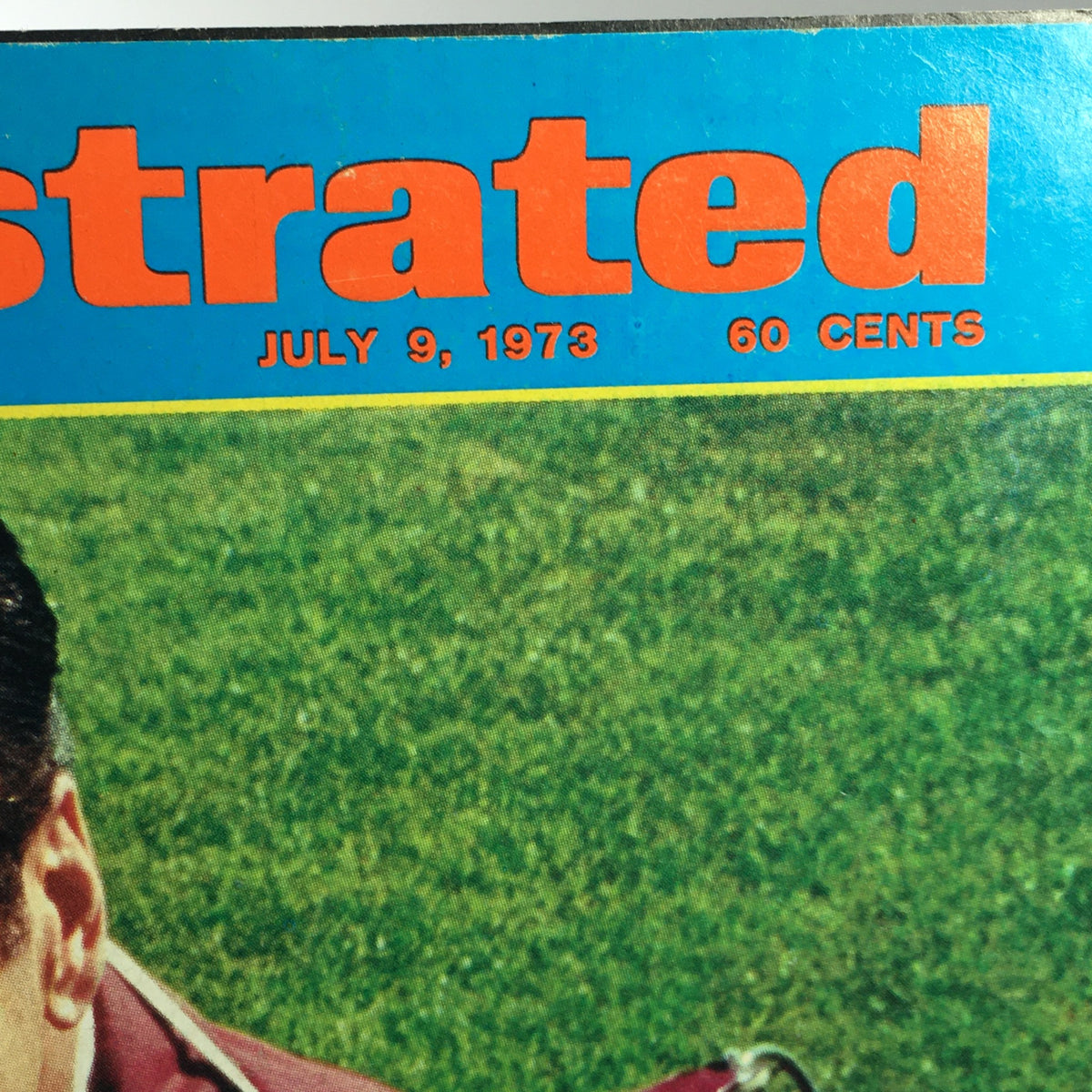 Close-up view of the Sports Illustrated magazine title and date from the July 9 1973 issue. The magazine displays the publication date prominently, adding to its collectible appeal for sports enthusiasts.