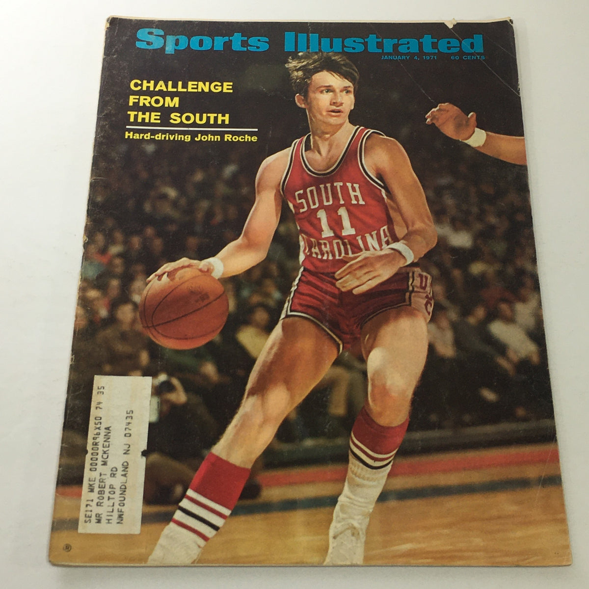 Cover of Sports Illustrated, January 4, 1971, featuring hard-driving John Roche from the South, showcasing basketball action with the headline 'Challenge from the South.'