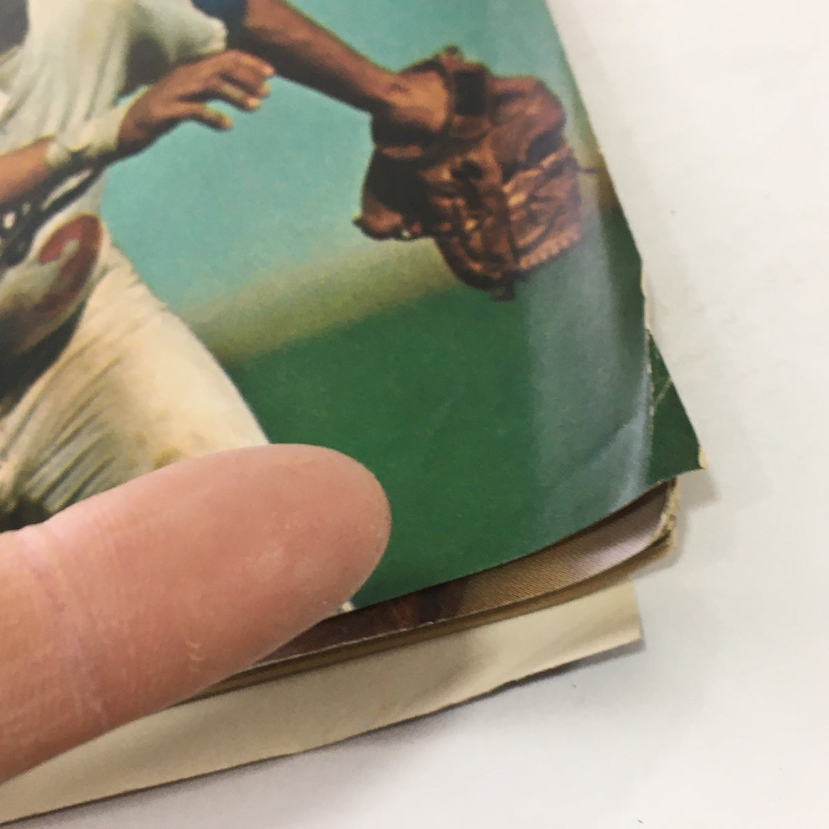 Close-up image of a baseball player catching a ball, featured in the Sports Illustrated: September 27 1971 issue, showcasing the action of Major League Baseball.