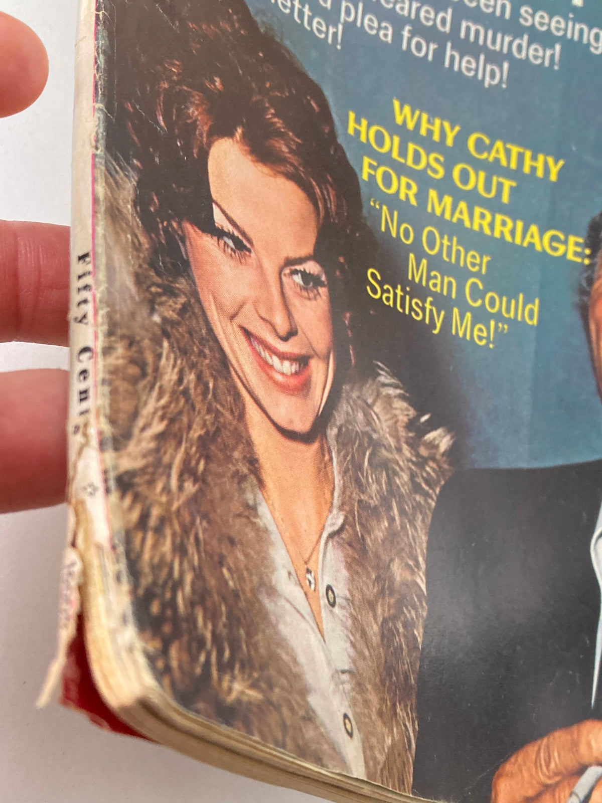 Detailed view of the side of VTG TV Radio Mirror Magazine April 1971, highlighting wear and a smiling woman in a fur coat.