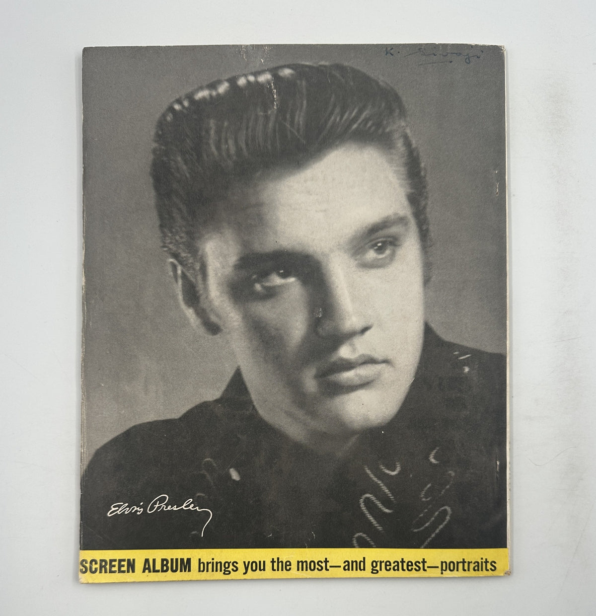Cover of Screen Album Magazine February 1957 featuring Elvis Presley. The magazine highlights major portraits of stars with a black-and-white image of Elvis showcasing his iconic hairstyle and style.