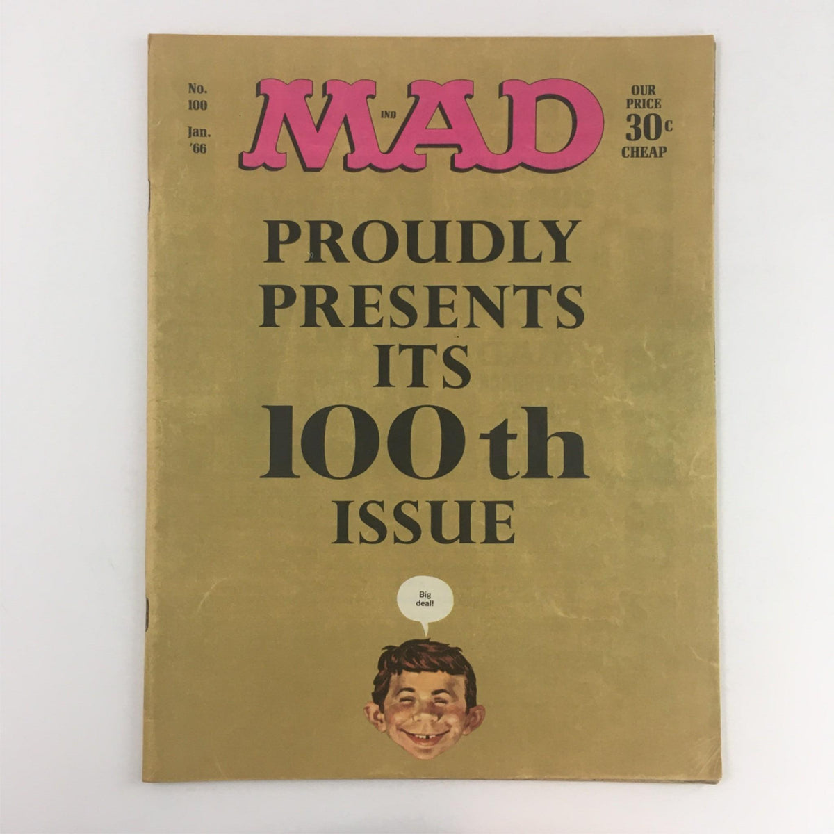 Mad Magazine January 1966 No. 100 Special 100th Issue, showcasing a vintage cover with bold text and an illustration of a smiling character, highlighting it as an important collectible.