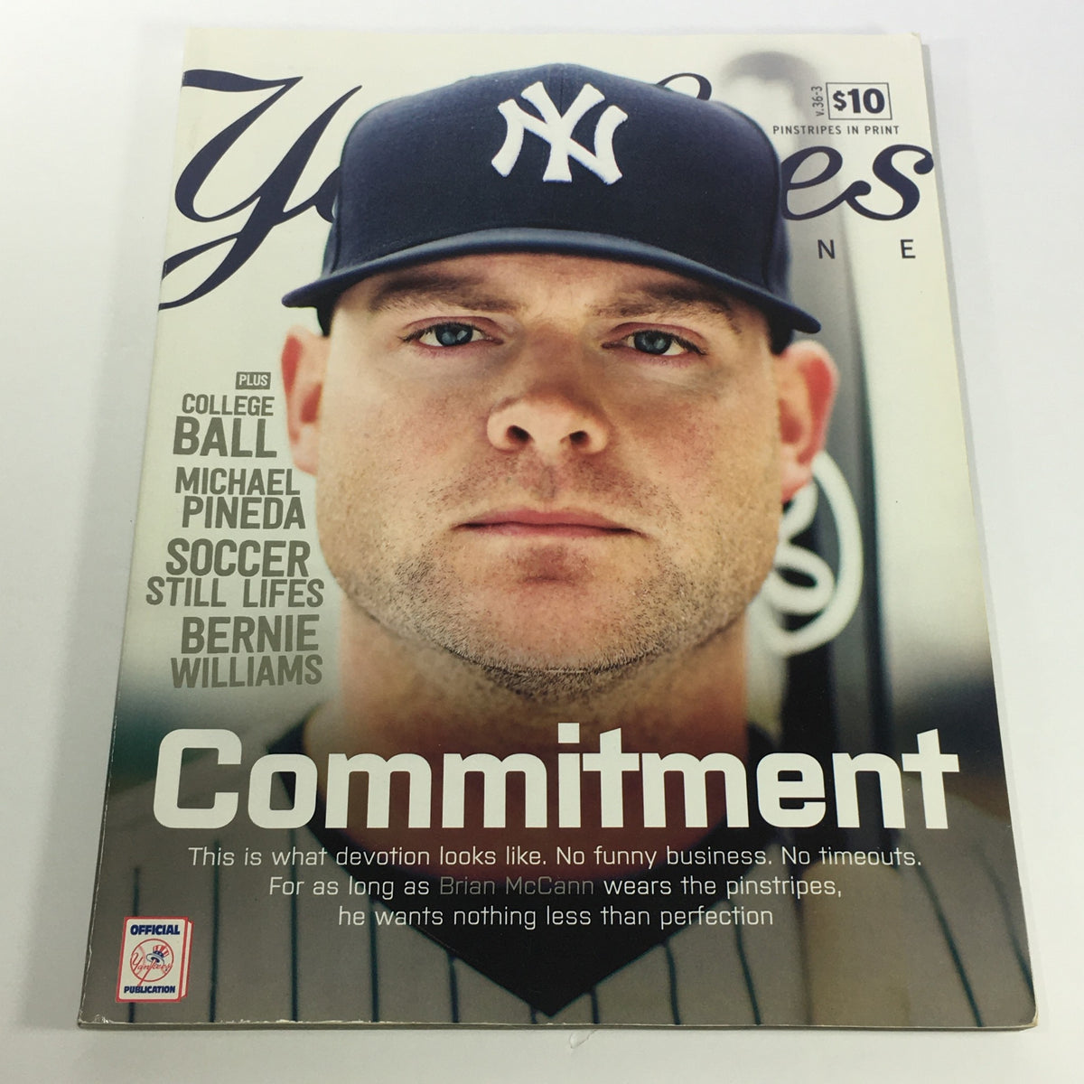 Cover of Yankees Magazine: May 2015 Volume #36-3 featuring Brian McCann with the title 'Commitment', highlighting his dedication as a catcher for the New York Yankees.