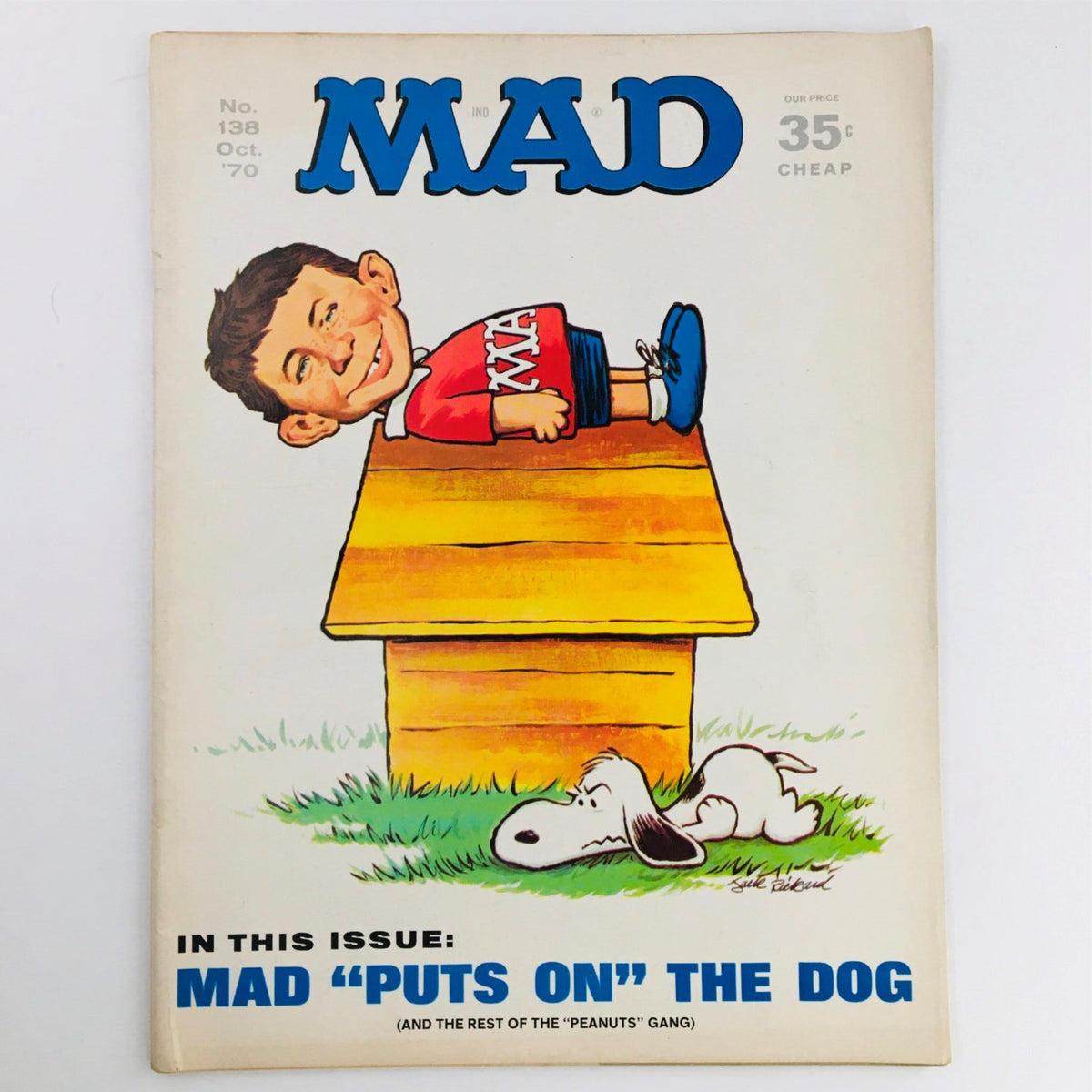 Mad Magazine October 1970 No. 138: Mad Puts On The Dog cover featuring a humorous illustration of a character lounging on a doghouse, showcasing the magazine's quirky satire and collaboration with Peanuts.