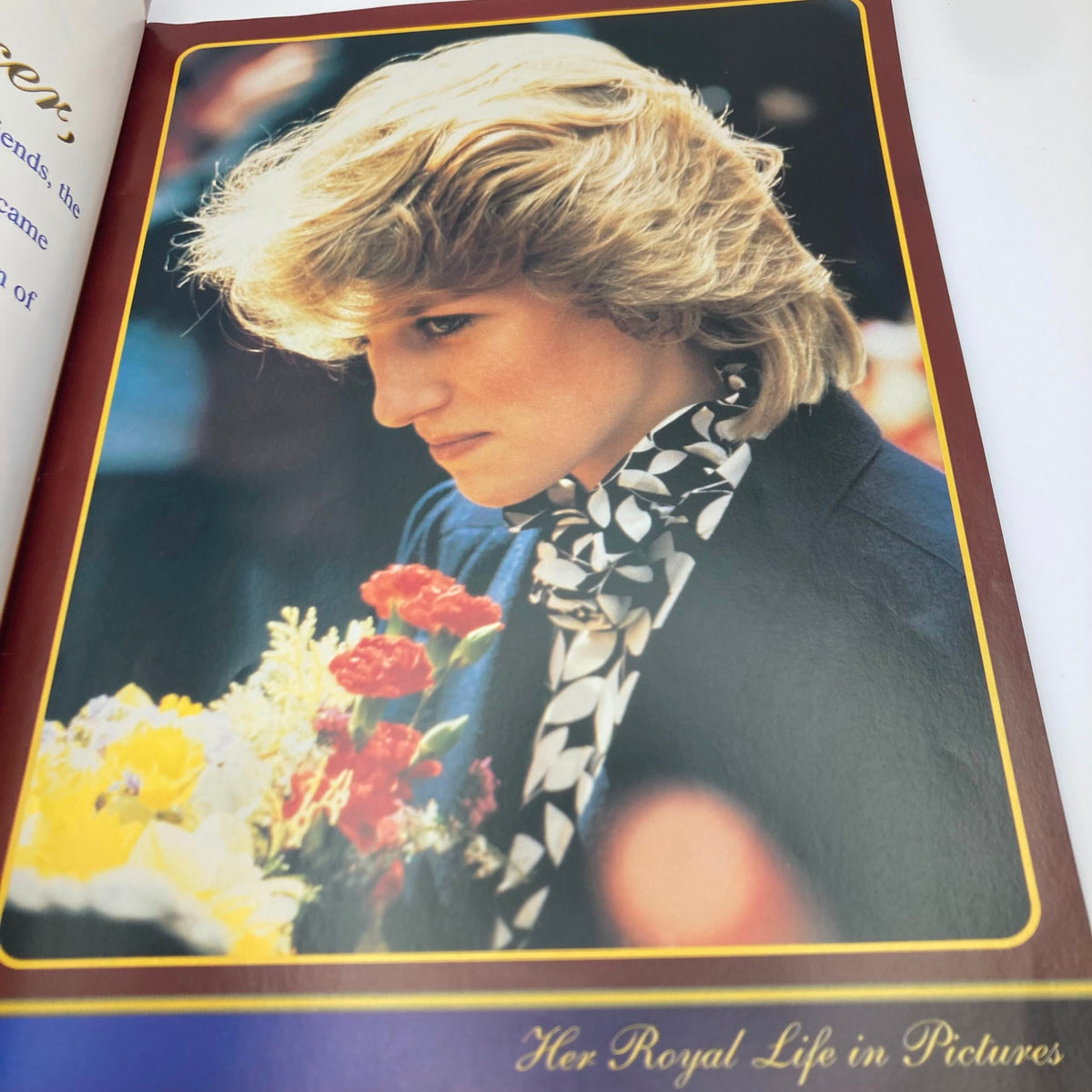 A portrait of Princess Diana surrounded by flowers, showcasing her elegance and grace. The image reflects her royal life and legacy in the People Weekly Magazine September 22 1997 Goodbye, Princess Diana.