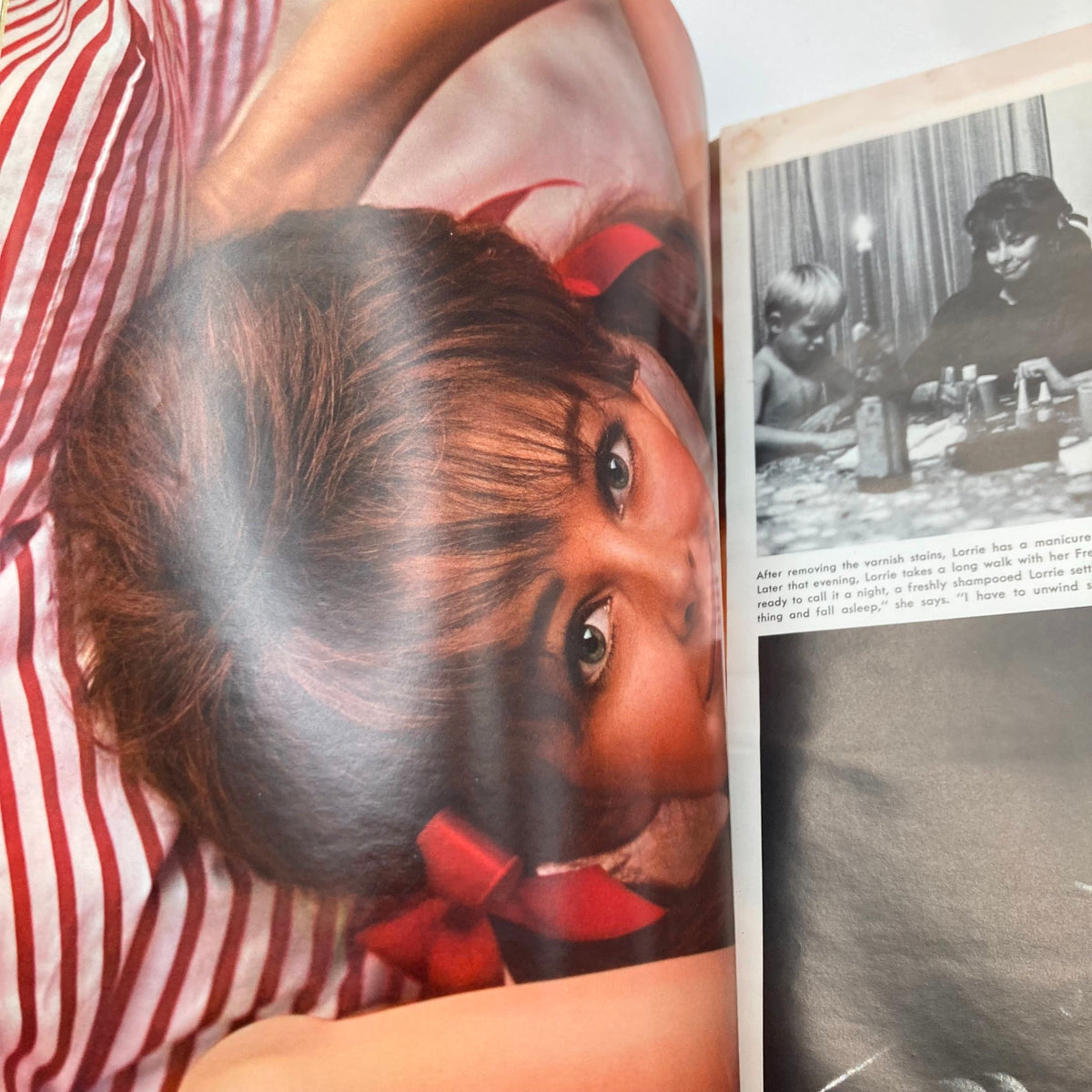 Interior page from Playboy Magazine February 1969 featuring a striking image of a model with a red ribbon in her hair, reflecting the glamor of the late 1960s.