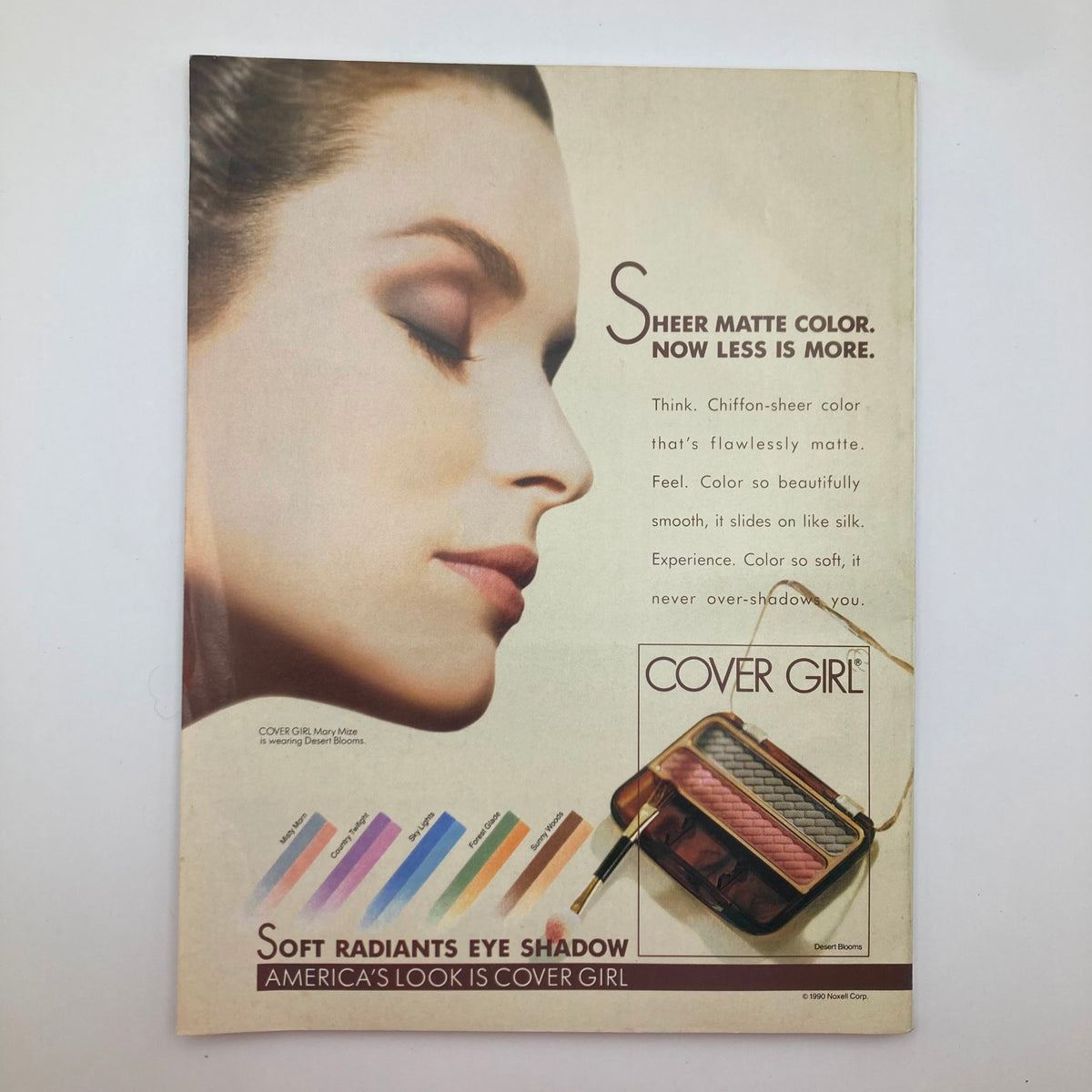 Back cover of McCall's Magazine October 1990 showcasing a Cover Girl advertisement for Soft Radiants Eye Shadow, emphasizing sheer matte color.